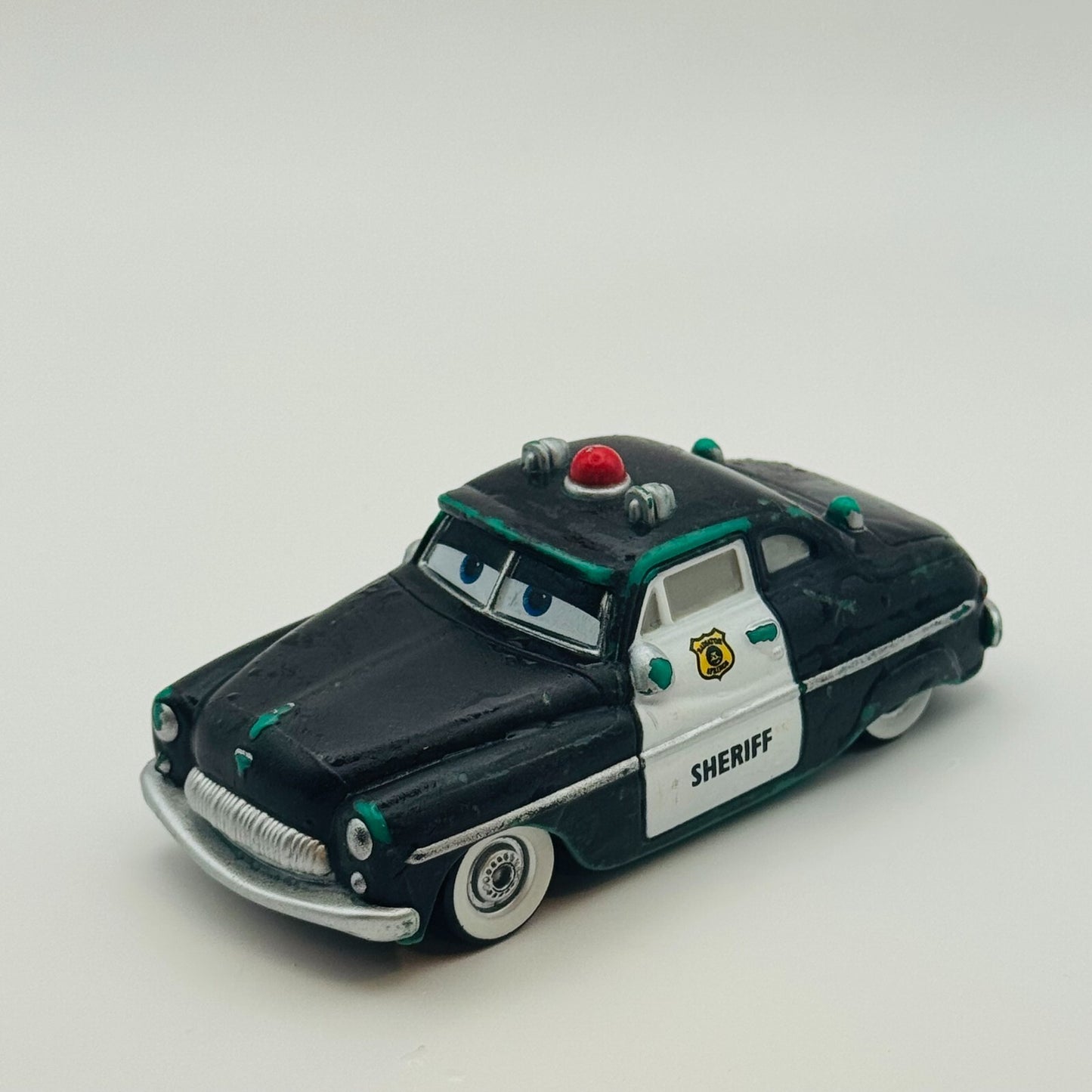 Disney Pixar Cars - COLOR CHANGERS SHERIFF GREEN/BLACK 2011 - 1:55 Scale