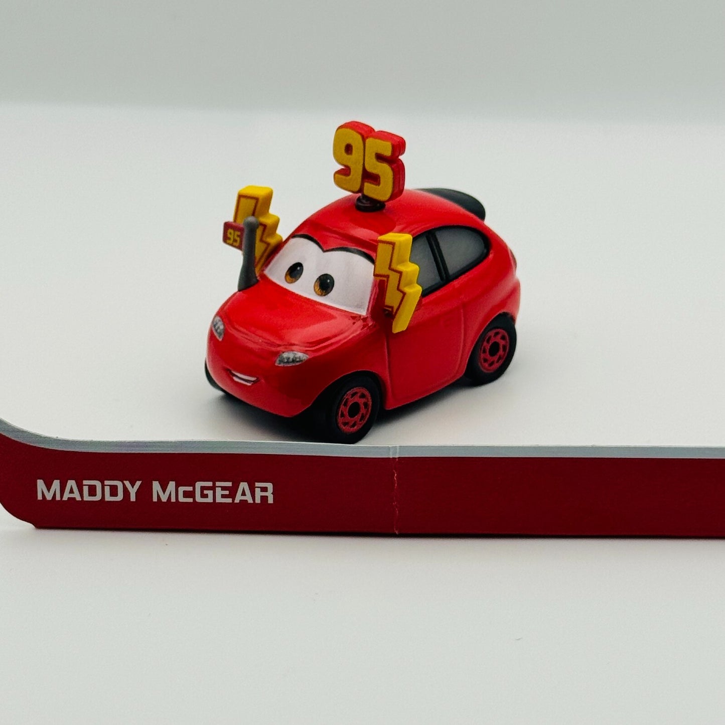 Disney Pixar Cars - MADDY MCGEAR (THAILAND) 2021 - 1:55 Diecast