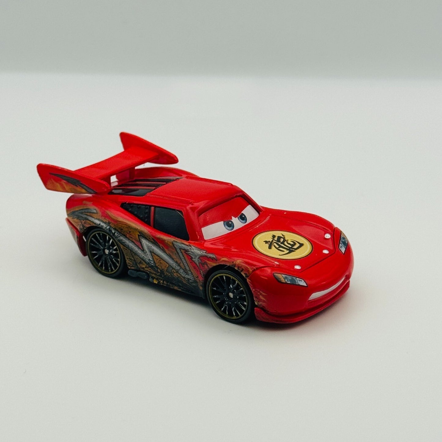 Disney Pixar Cars Toon - DRAGON MCQUEEN WITH OIL STAINS Tokyo Mater 1:55 Diecast