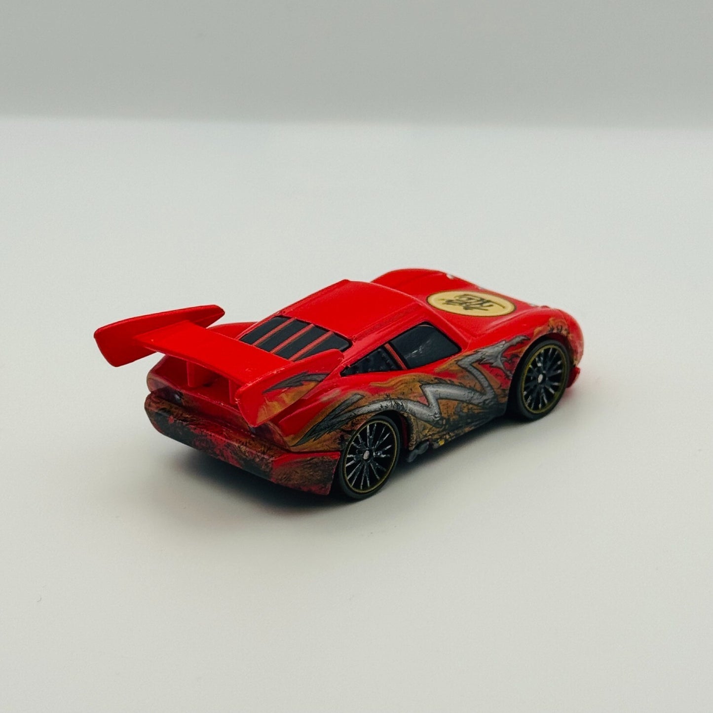 Disney Pixar Cars Toon - DRAGON MCQUEEN WITH OIL STAINS Tokyo Mater 1:55 Diecast