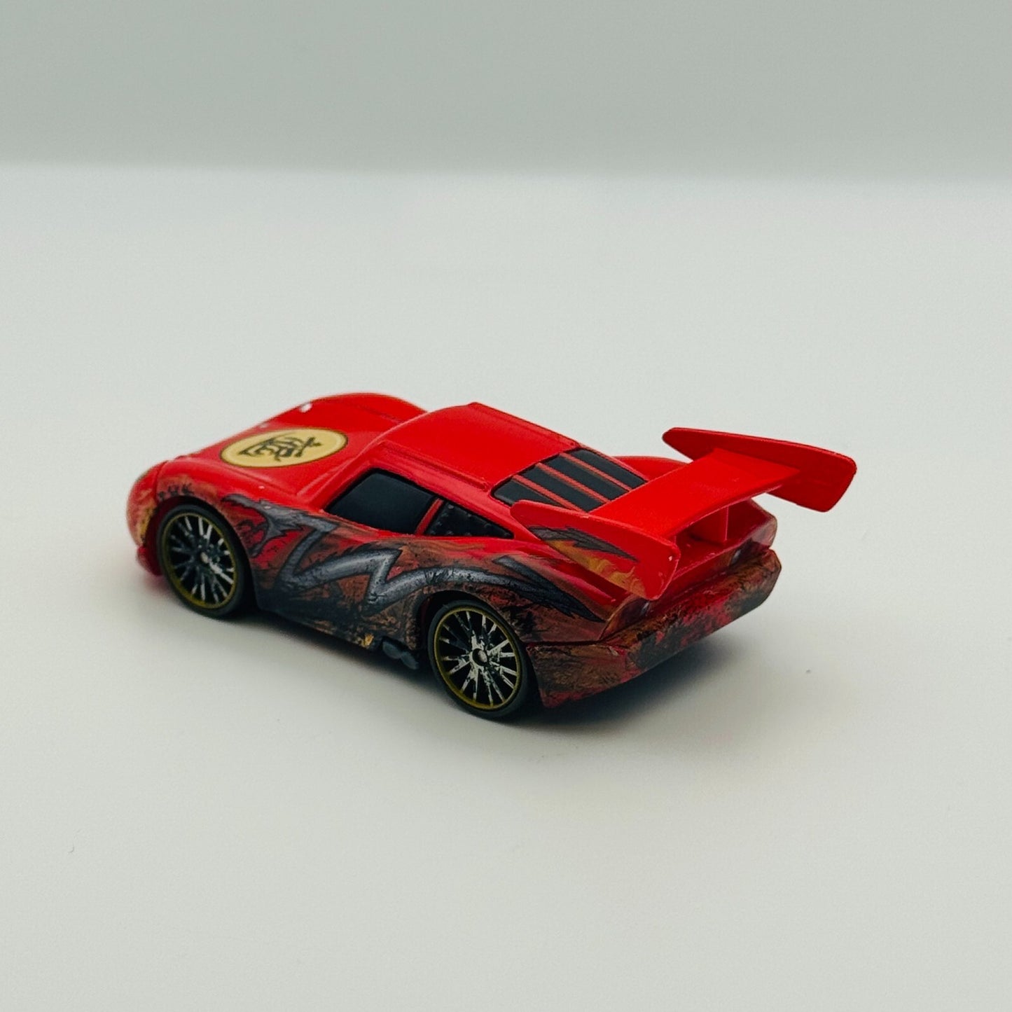 Disney Pixar Cars Toon - DRAGON MCQUEEN WITH OIL STAINS Tokyo Mater 1:55 Diecast
