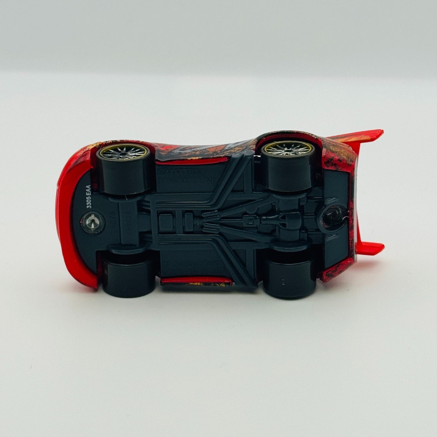 Disney Pixar Cars Toon - DRAGON MCQUEEN WITH OIL STAINS Tokyo Mater 1:55 Diecast