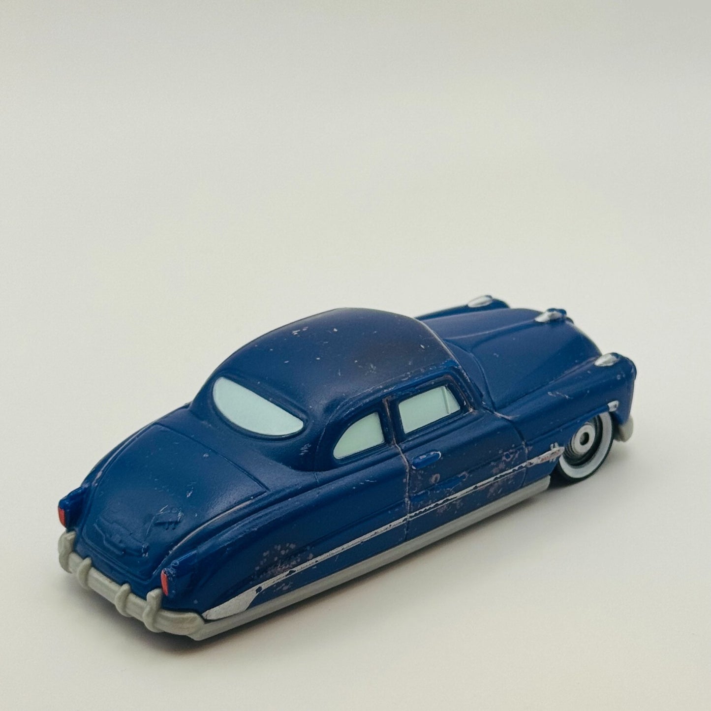 Disney Pixar Cars - COLOR CHANGERS DOC HUDSON BLACK/BLUE 2010 - 1:55 Scale