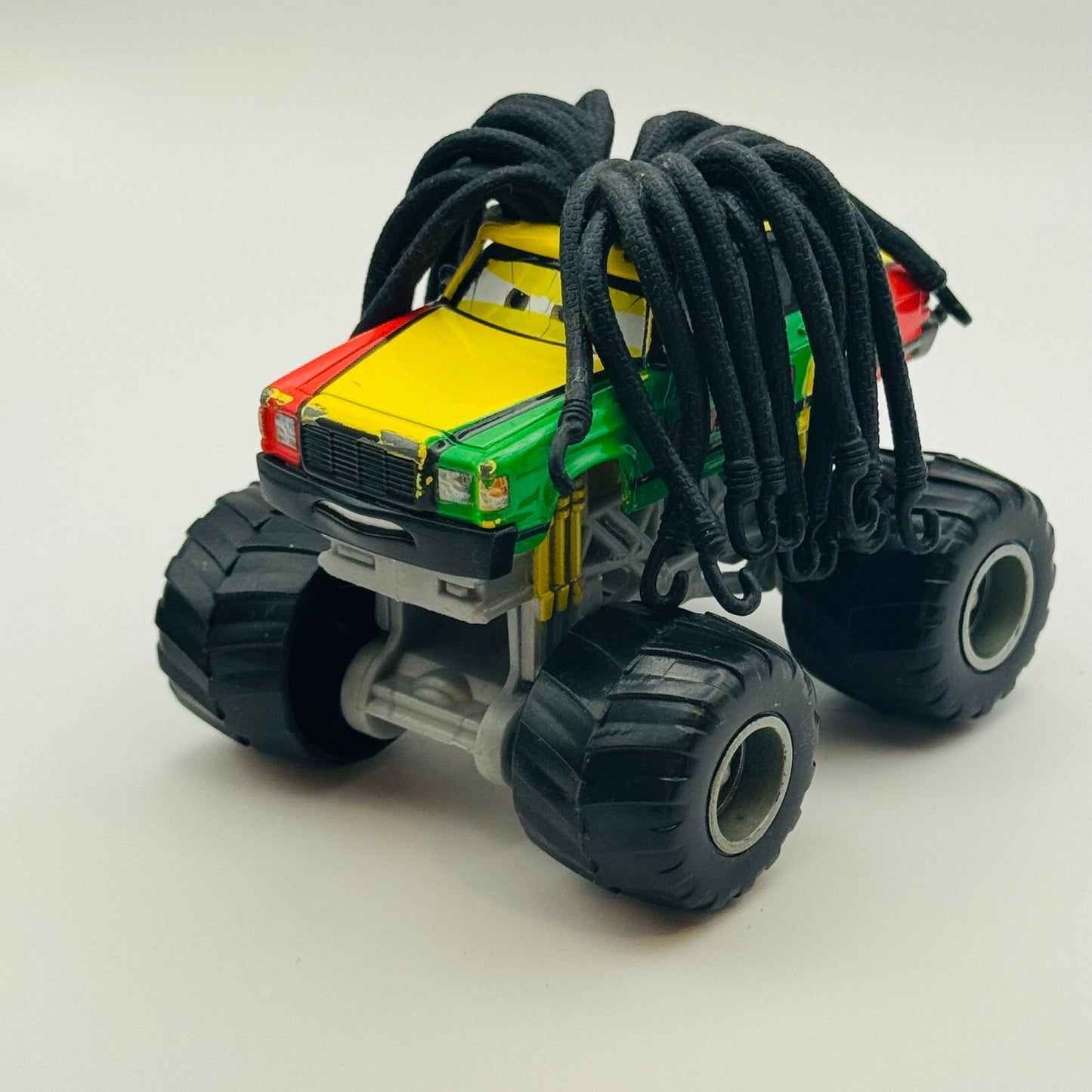 Disney Pixar Cars Toon - RASTA CARIAN Monster Truck Mater 2010 - 1:55 Diecast