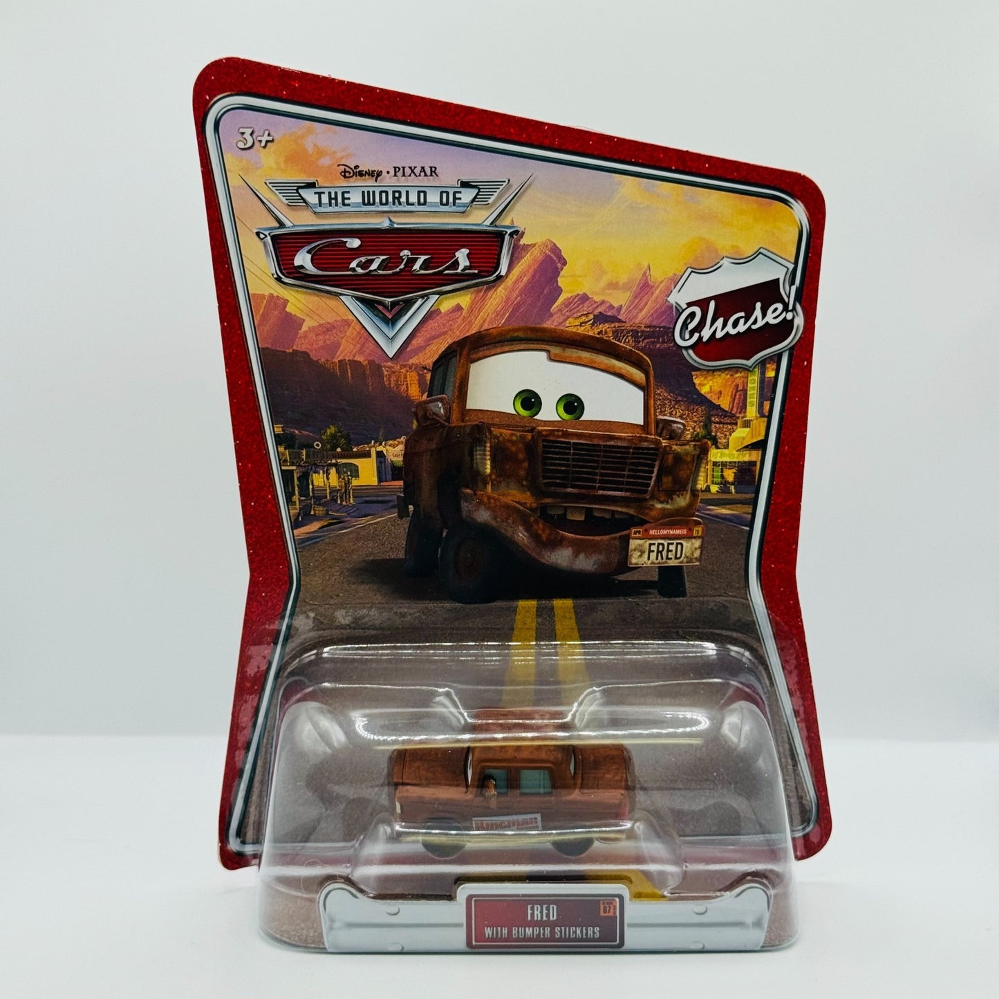 Disney Pixar Cars - FRED WITH BUMPER STICKERS World Of Cars 2008 - 1:55 Diecast