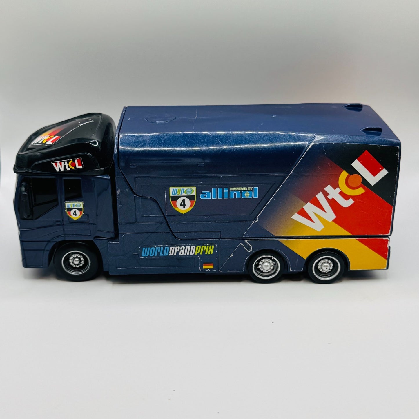 Disney Pixar Cars - MAX SCHNELL HAULER JORG Transforming Transporter 1:55 Scale