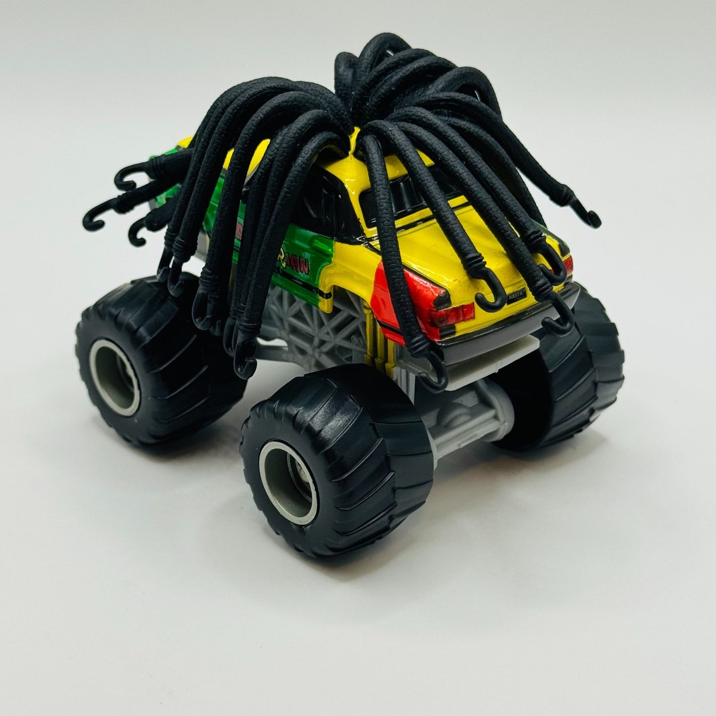 Disney Pixar Cars Toon - RASTA CARIAN Monster Truck Mater - 1:55 Diecast