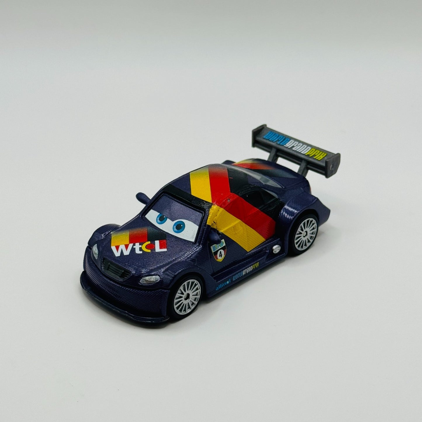 Disney Pixar Cars - MAX SCHNELL RUBBER TIRES Cars 2 - 1:55 Diecast