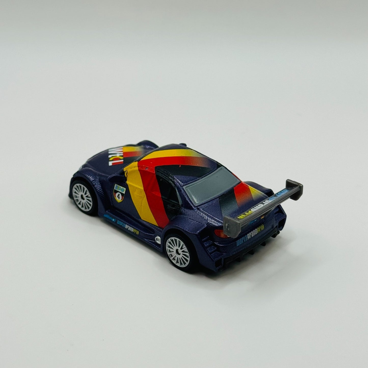 Disney Pixar Cars - MAX SCHNELL RUBBER TIRES Cars 2 - 1:55 Diecast