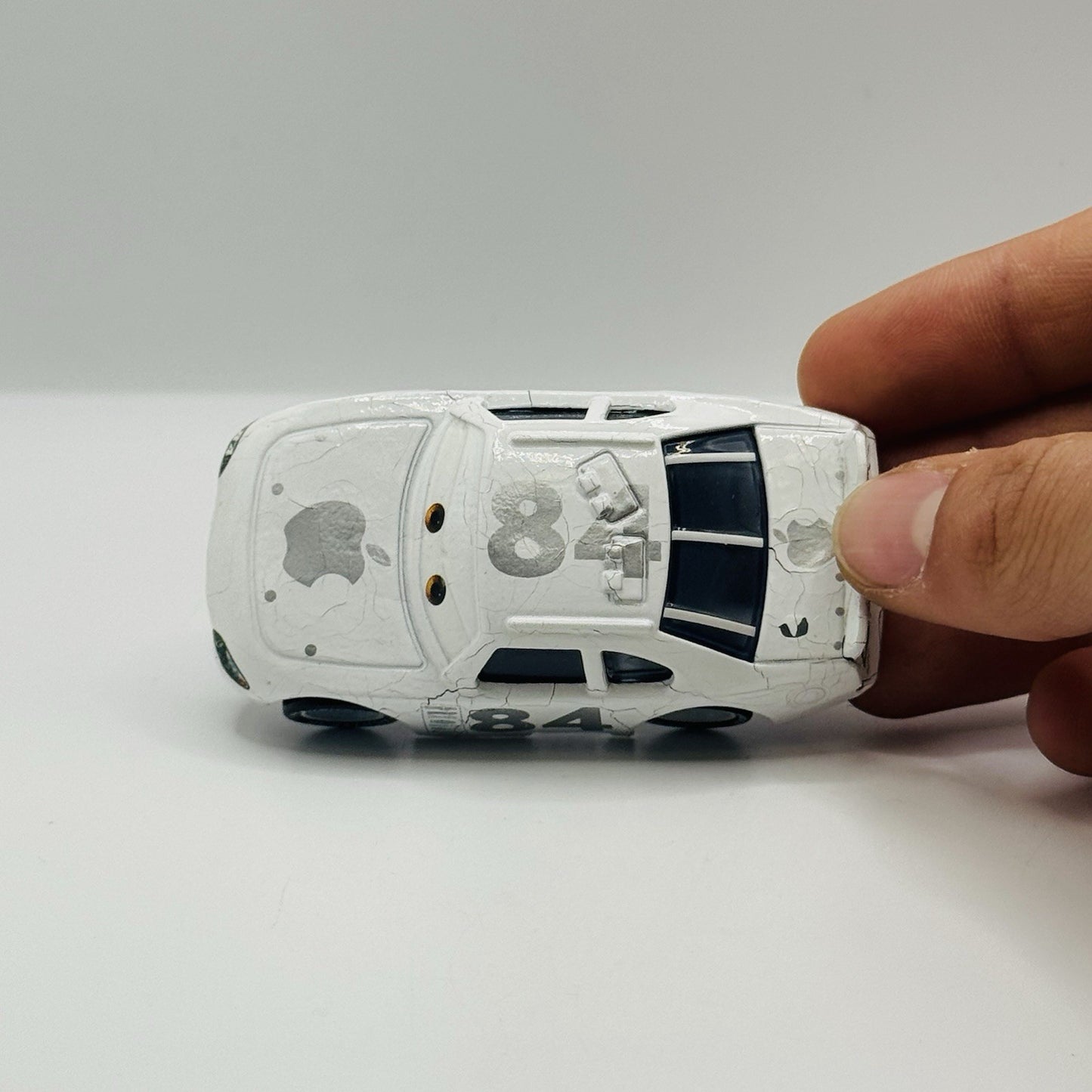 Disney Pixar Cars 1/1000 APPLE CAR SPEEDWAY OF THE SOUTH *Zinc Pest 1:55 Diecast