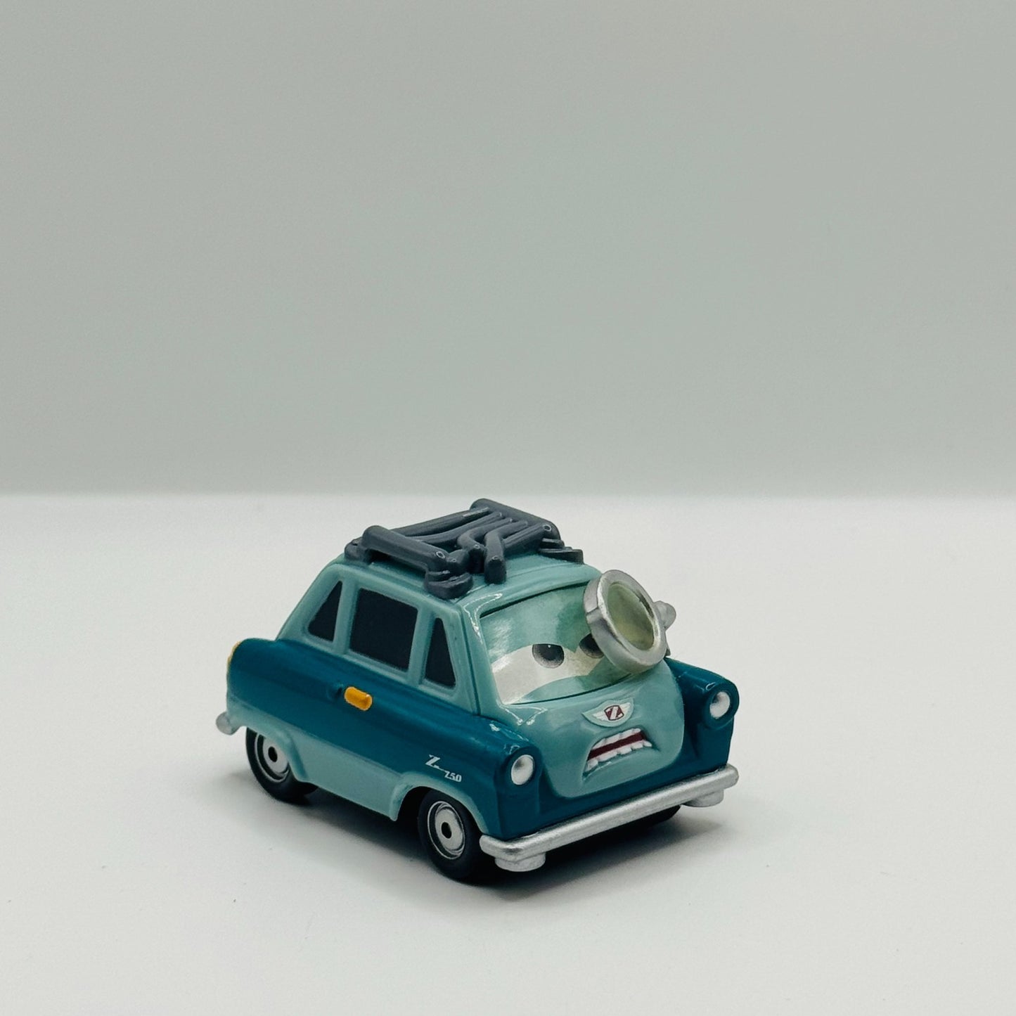 Disney Pixar Cars - QUICK CHANGERS PROFESSOR Z WITH POP OUT WEAPON - 1:55 Scale
