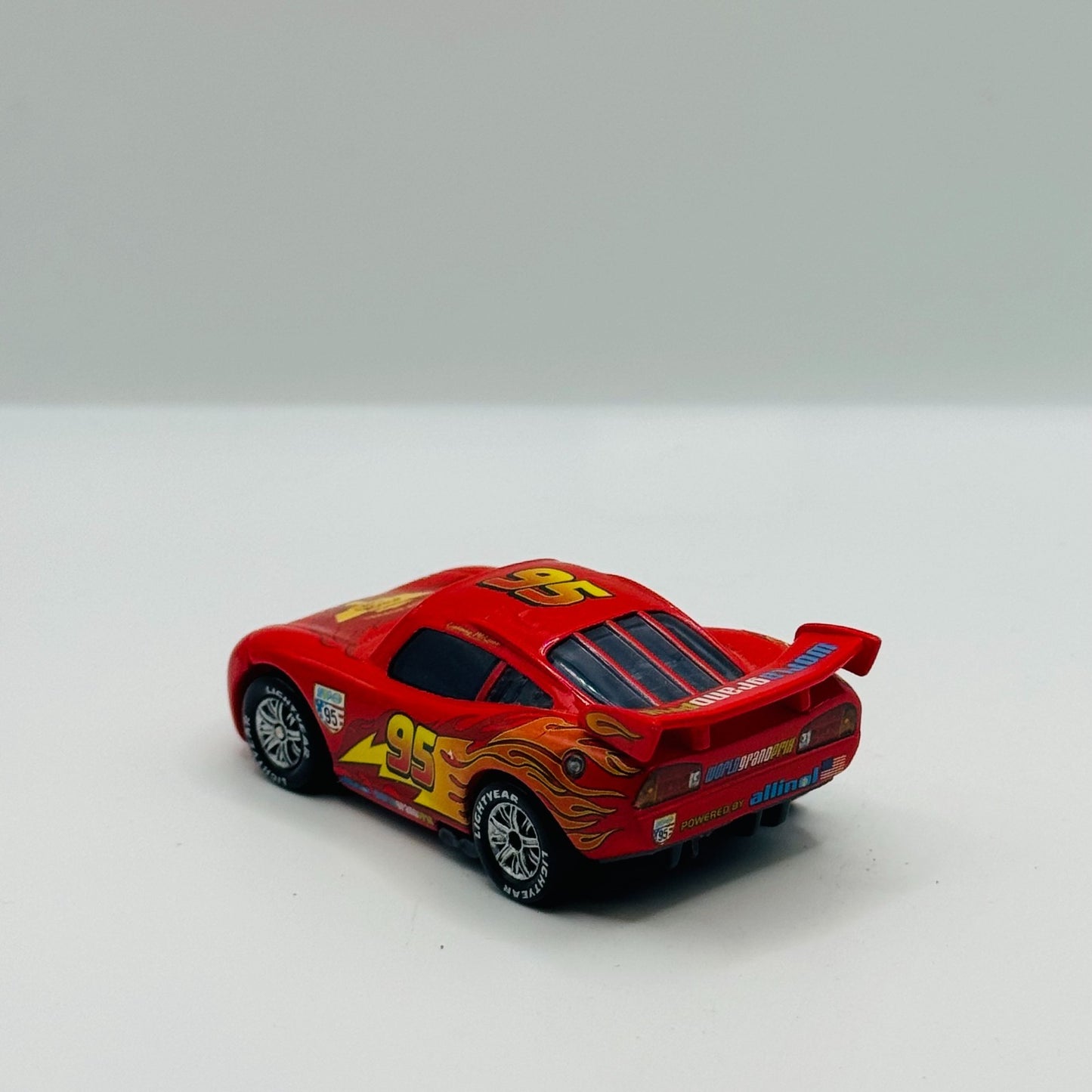 Disney Pixar Cars - LIGHTNING MCQUEEN WITH PARTY WHEELS - 1:55 Diecast