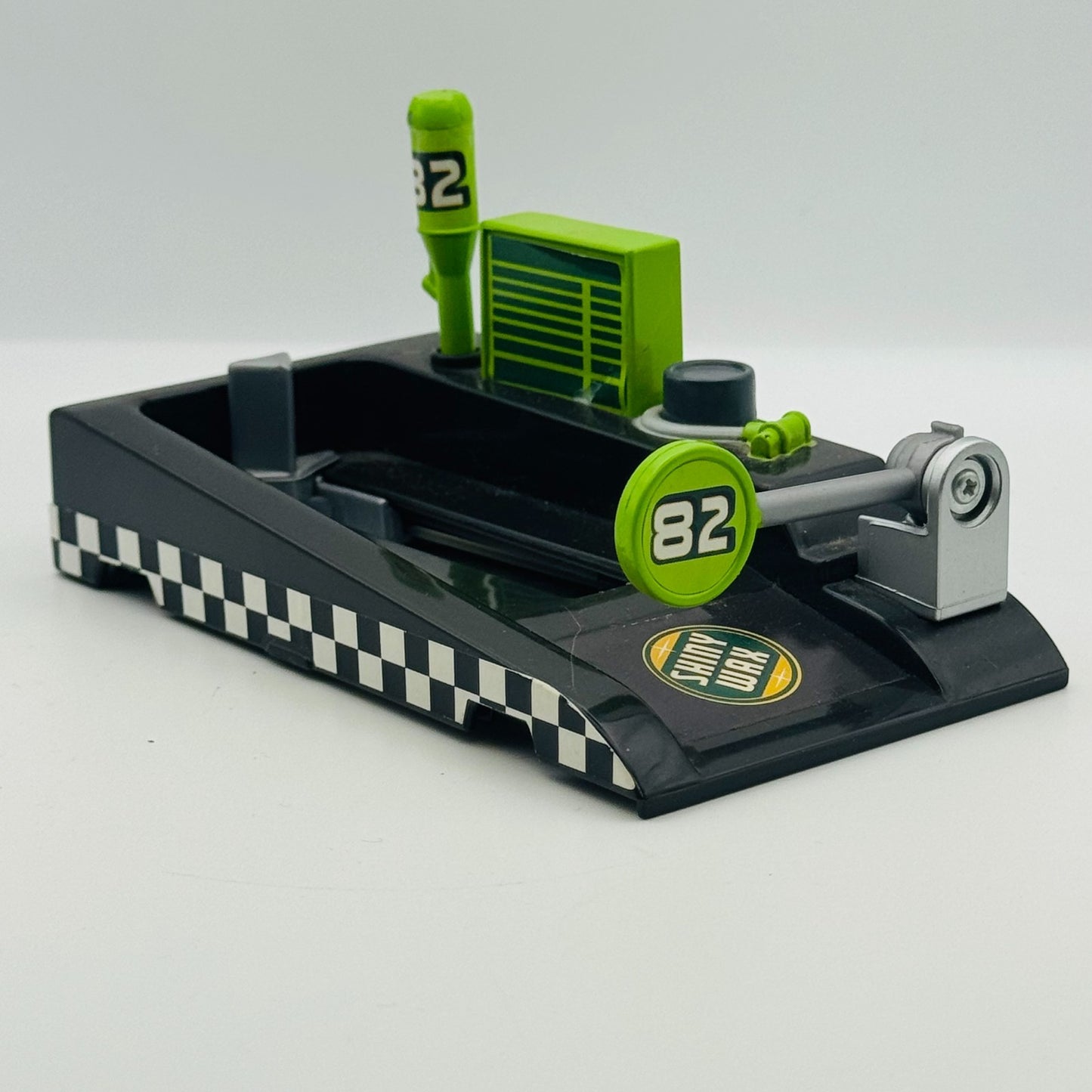 Disney Pixar Cars - SHINY WAX PIT-RACE OFF LAUNCHER Piston Cup - 1:55 Diecast