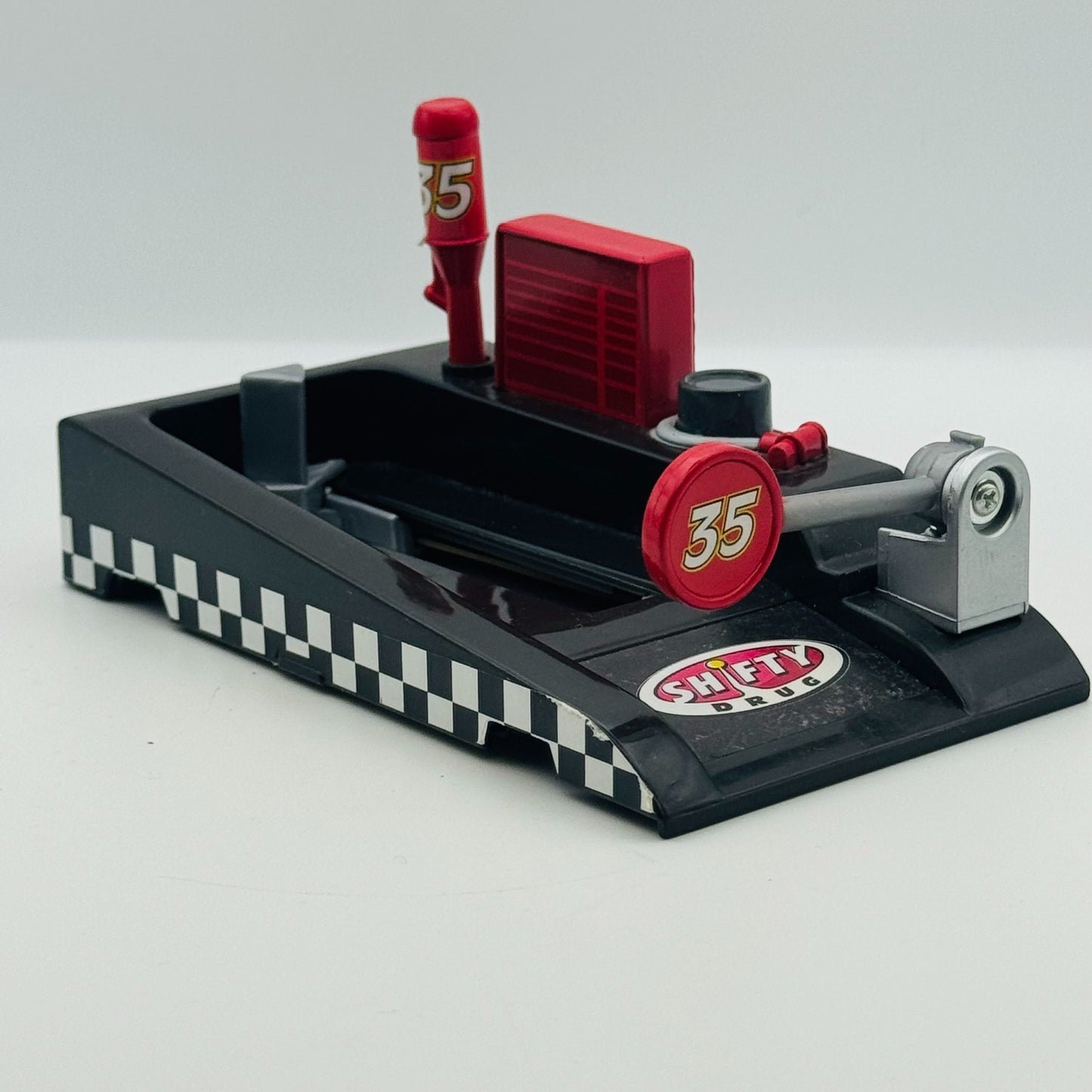 Disney Pixar Cars - SHIFTY DRUG PIT-RACE OFF LAUNCHER Piston Cup - 1:55 Diecast