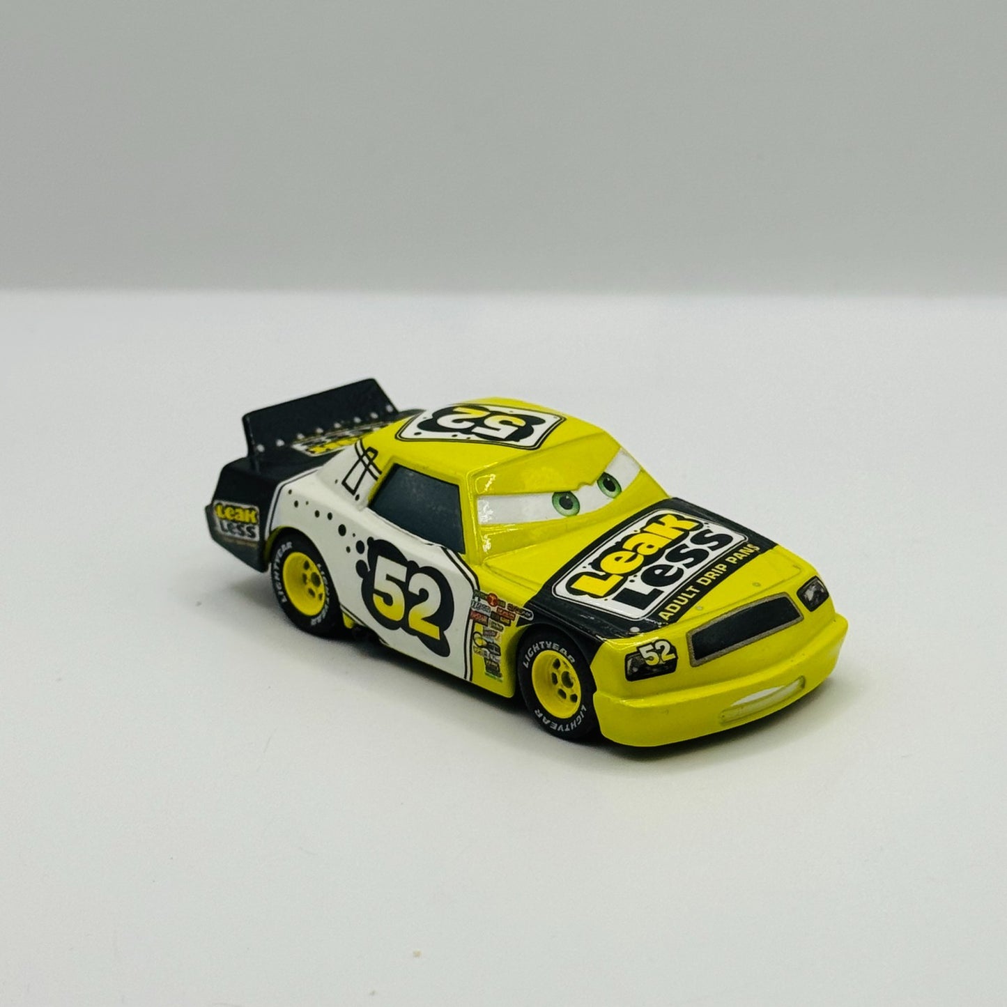 Disney Pixar Cars CLAUDE SCRUGGS LEAK LESS Rubber Tires Piston Cup 1:55 Diecast