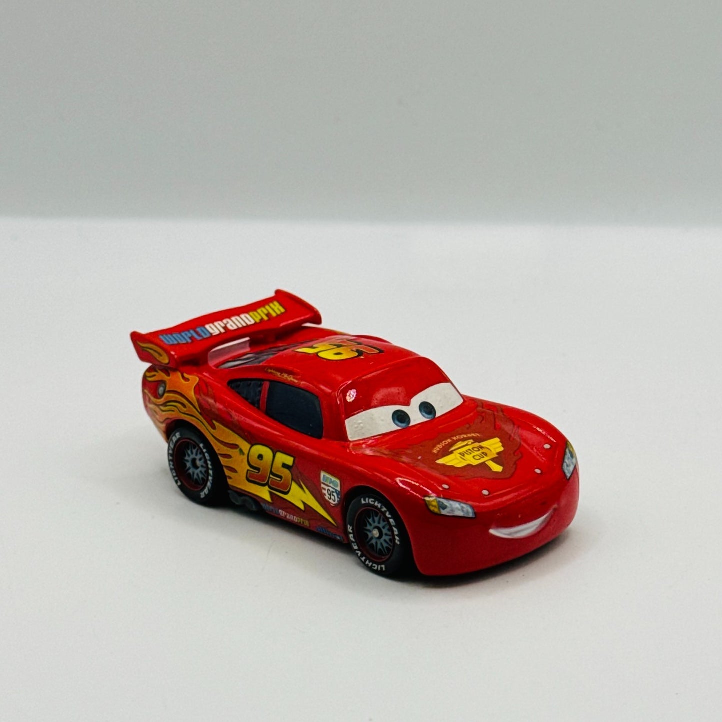 Disney Pixar Cars - WGP LIGHTNING MCQUEEN WITH RACING WHEELS - 1:55 Diecast