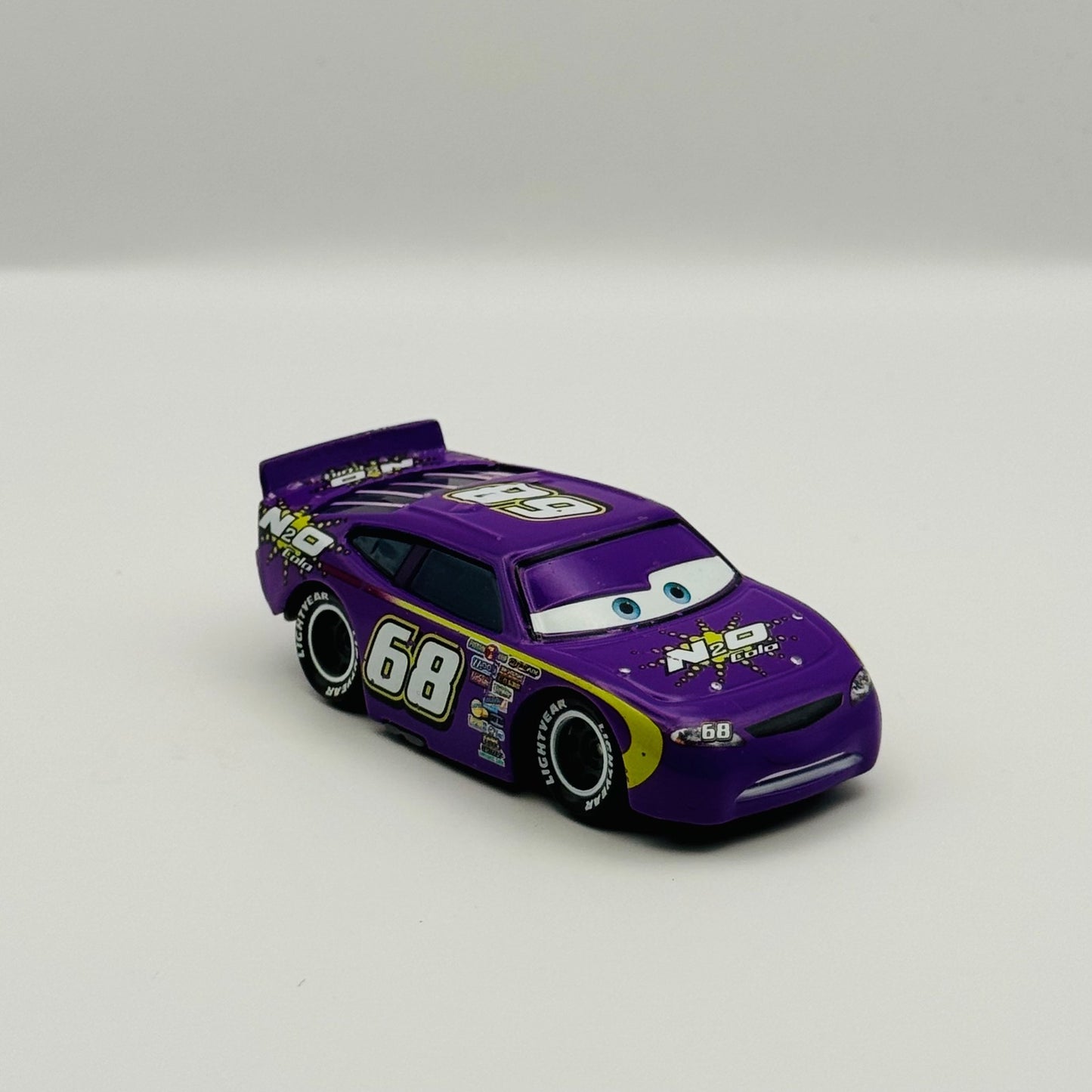 Disney Pixar Cars - MANNY FLYWHEEL N2O COLA Piston Cup - 1:55 Diecast