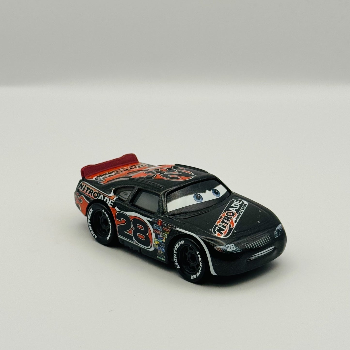 Disney Pixar Cars - NITROADE AIKEN AXLER Piston Cup - 1:55 Diecast