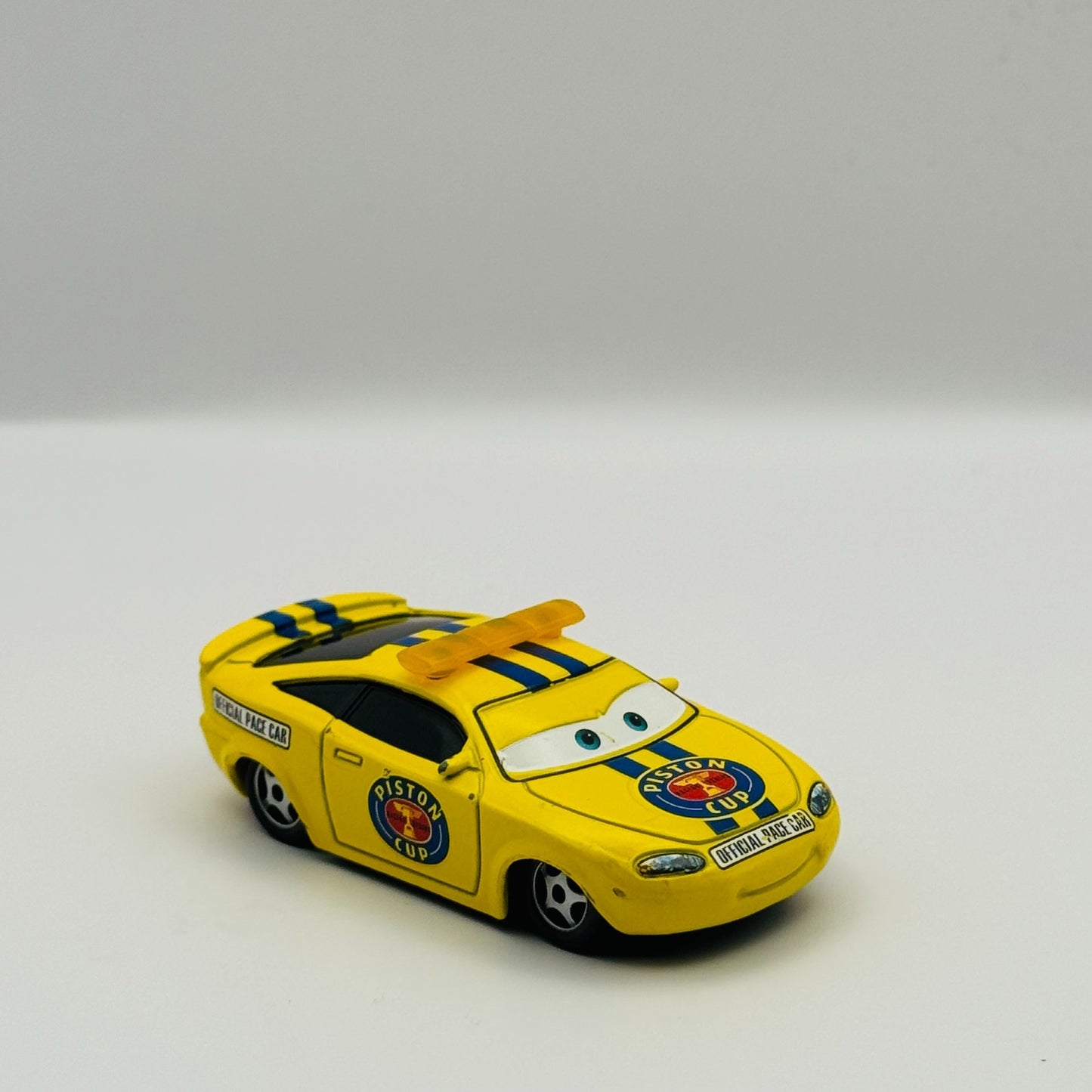 Disney Pixar Cars - CHARLIE CHECKER PACE CAR YELLOW TAILLIGHTS - 1:55 Diecast
