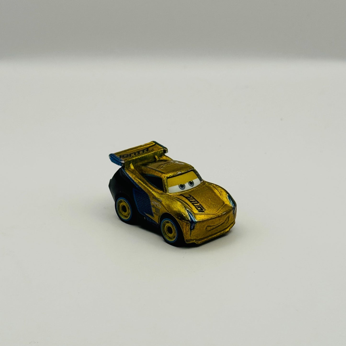 Disney Pixar Cars - Mini Racers GOLDEN GOLD JACKSON STORM - Diecast