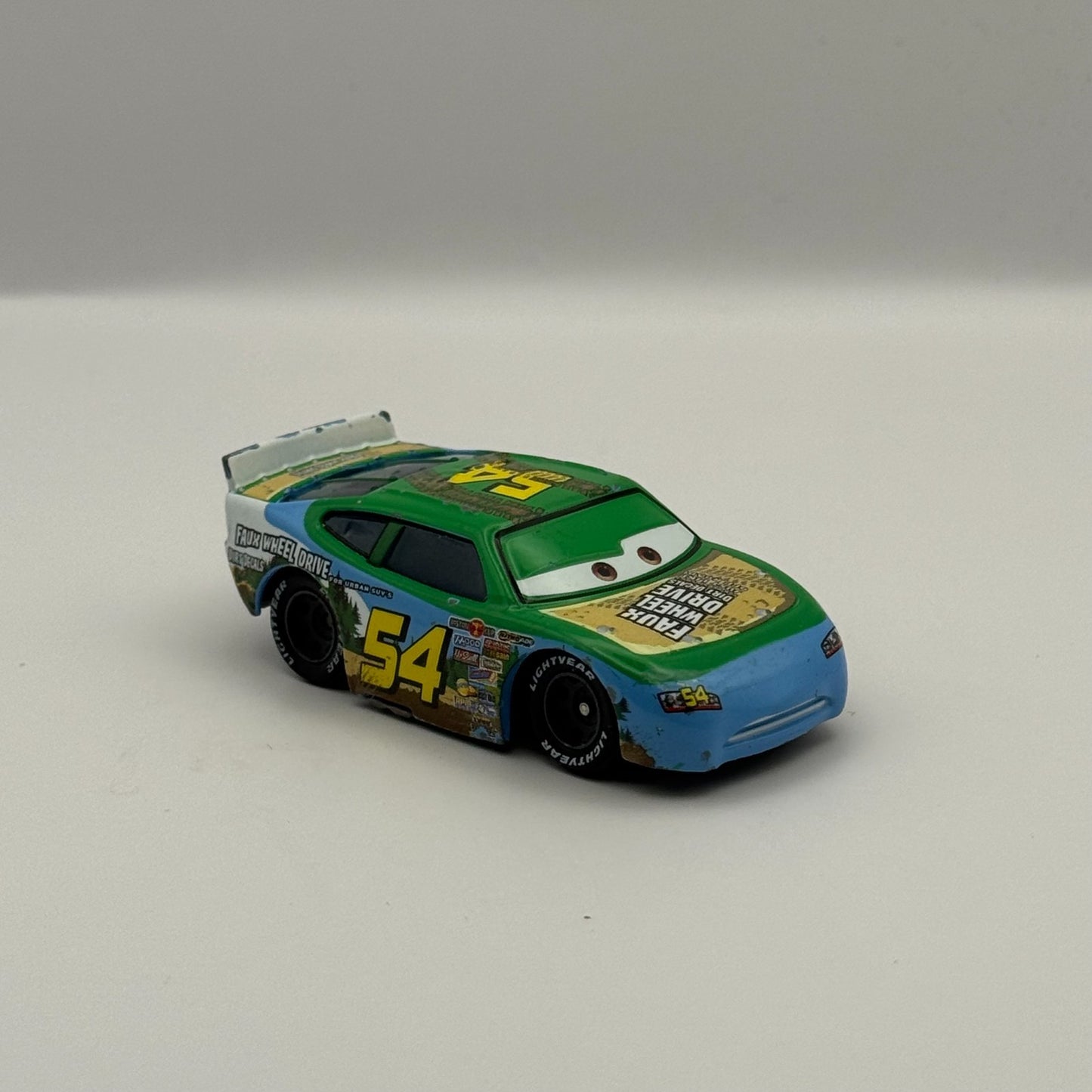 Disney Pixar Cars - JOHNNY BLAMER FAUX WHEEL DRIVE RUBBER TIRES - 1:55 Diecast