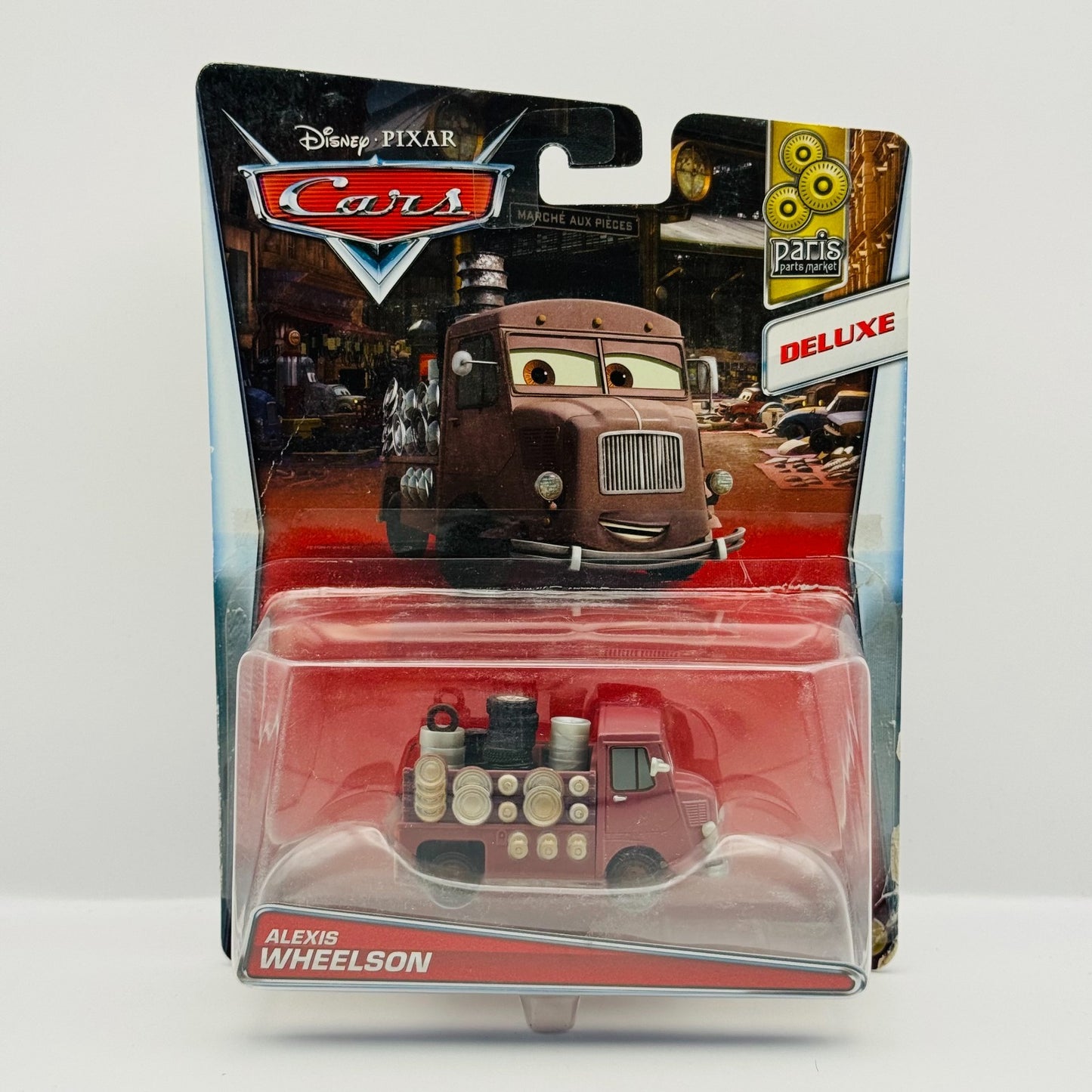 Disney Pixar Cars - ALEXIS WHEELSON Deluxe Paris Parts Market 2016- 1:55 Diecast