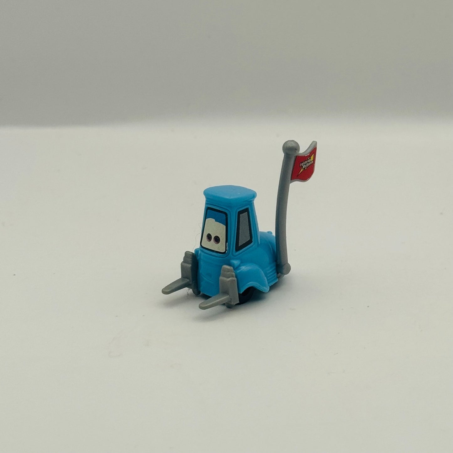 Disney Pixar Cars - GUIDO WITH FLAG - 1:55 Scale Plastic