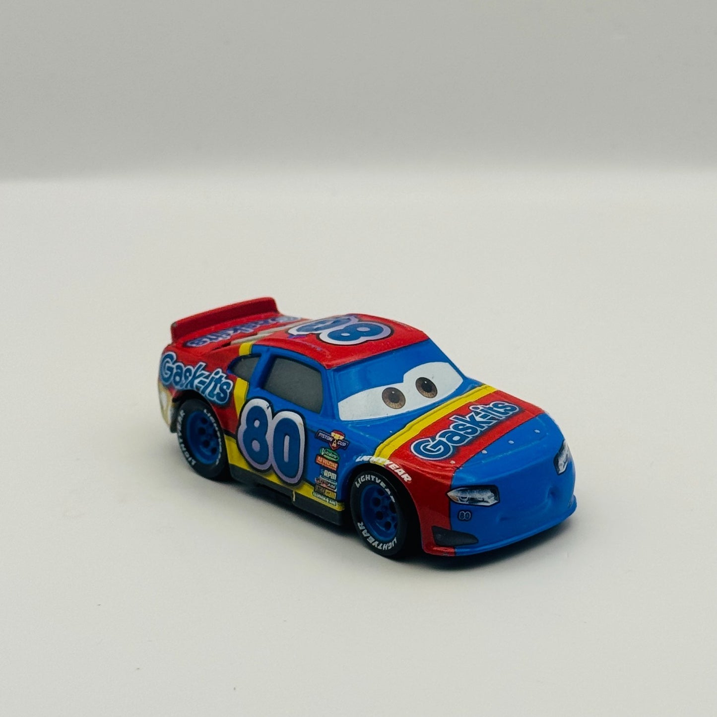Disney Pixar Cars - REX REVLER GASK-ITS Veteran Racer 2017 - 1:55 Diecast