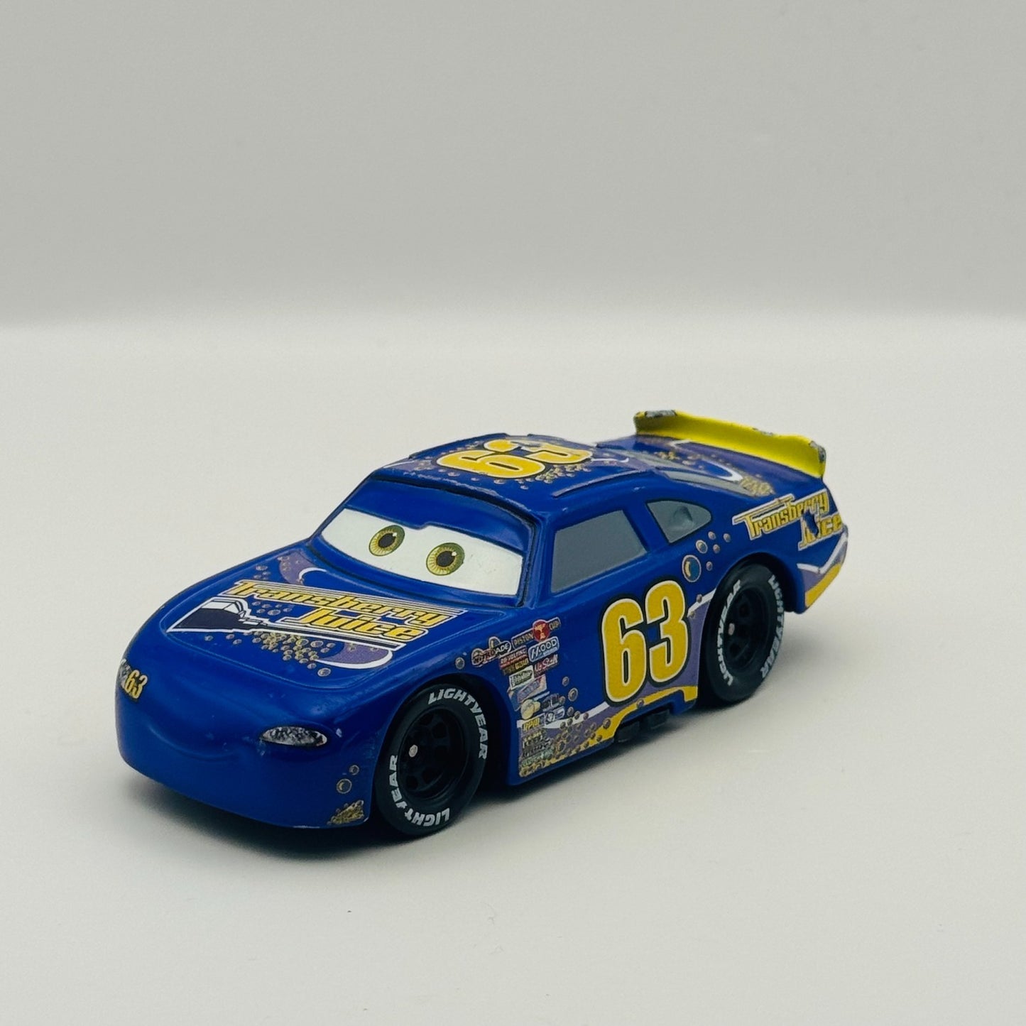 Disney Pixar Cars - TRANSBERRY JUICE LEE REVKINS Disney Store - 1:43 Diecast
