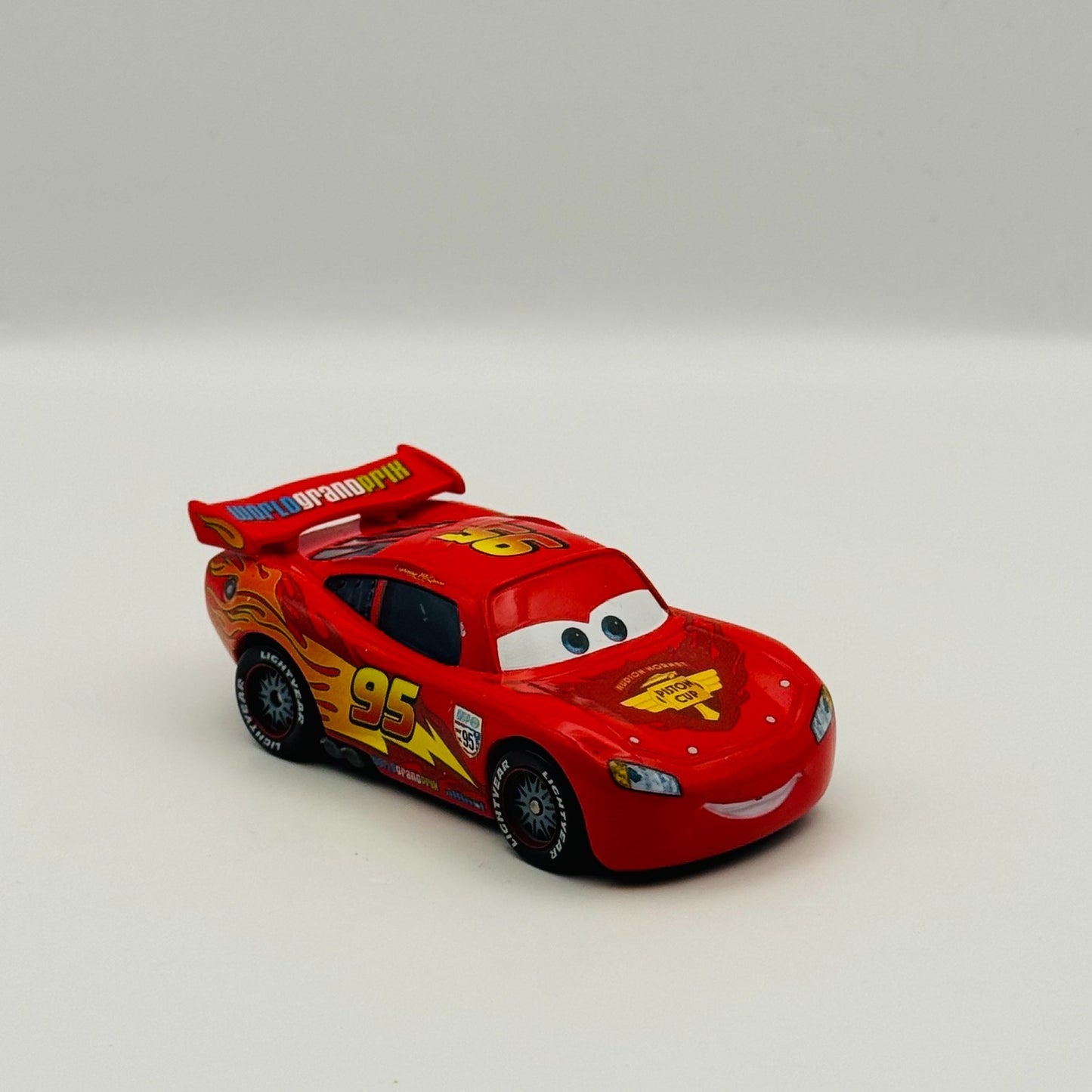 Disney Pixar Cars - WGP McQUEEN WITH RACING WHEELS Cars 2 2011 - 1:55 Diecast