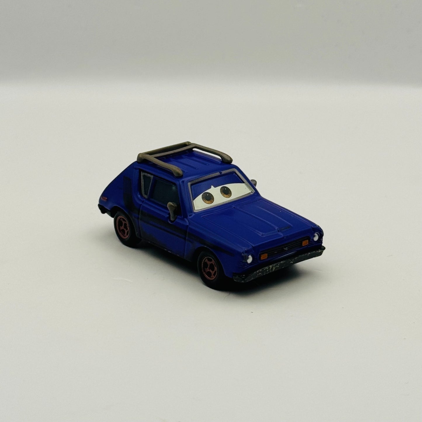 Disney Pixar Cars - DON CRUMLIIN (Brown Eyes) 2011 - 1:55 Diecast