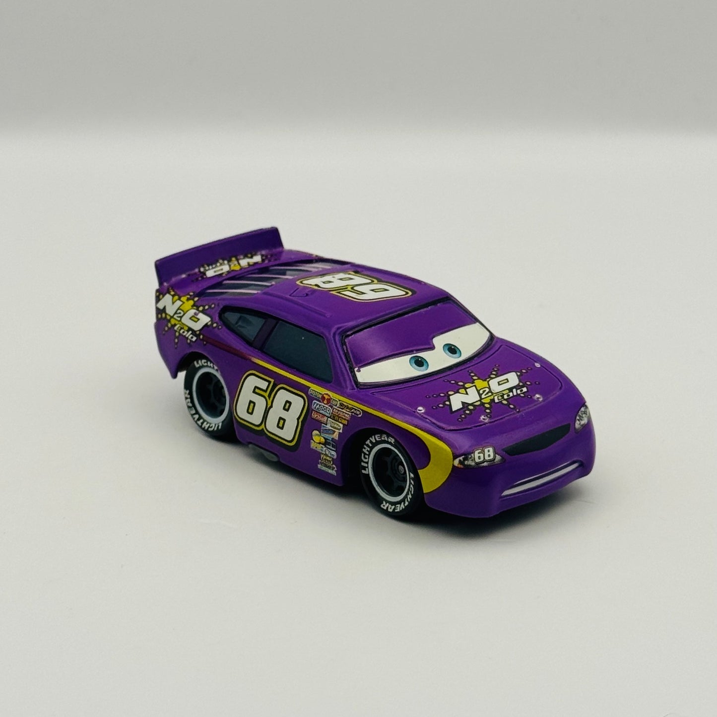 Disney Pixar Cars - N2O COLA MANNY FLYWHEEL Piston Cup 2017 - 1:55 Diecast