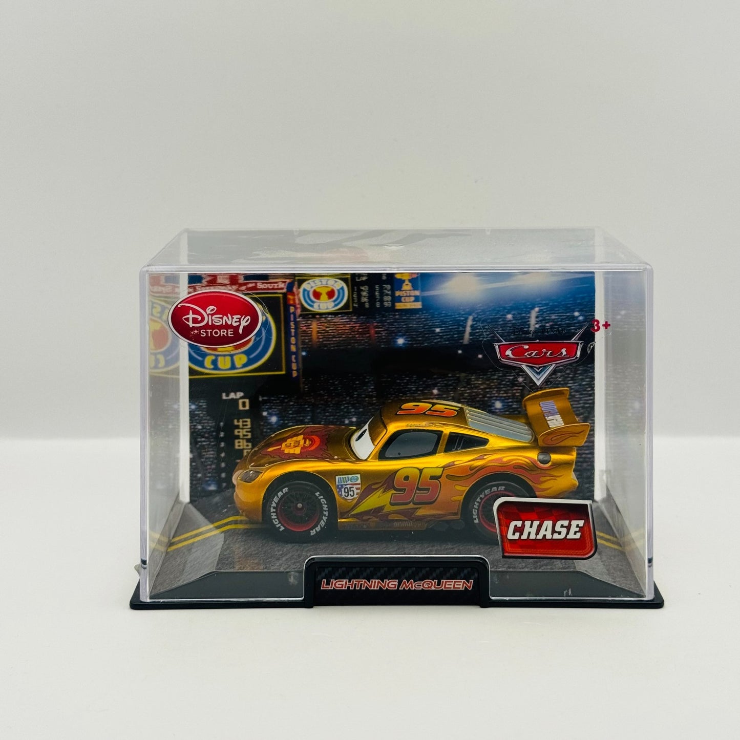 Disney Pixar Cars - GOLD WGP LIGHTNING MCQUEEN CHASE Disney Store - 1:43 Diecast
