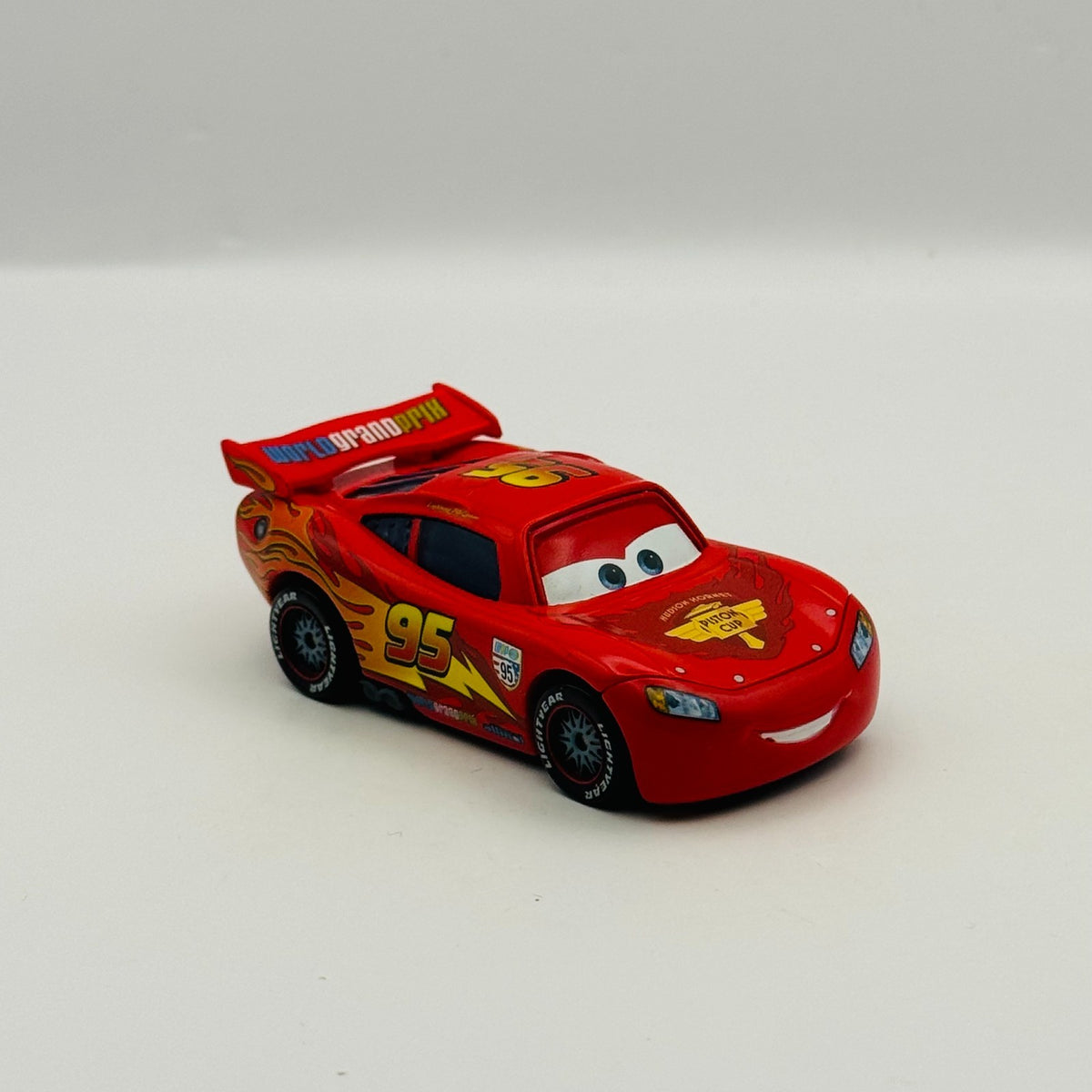 Disney Pixar Cars - WGP McQUEEN WITH RACING WHEELS Cars 2 2011 - 1:55 Diecast
