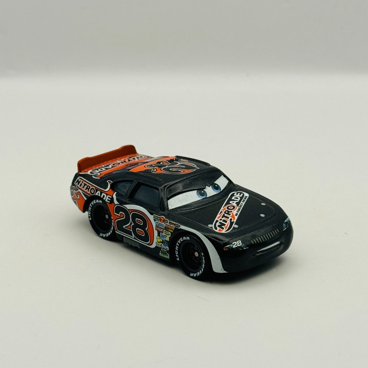 Disney Pixar Cars - NITROADE AIKEN AXLER Piston Cup - 1:55 Diecast