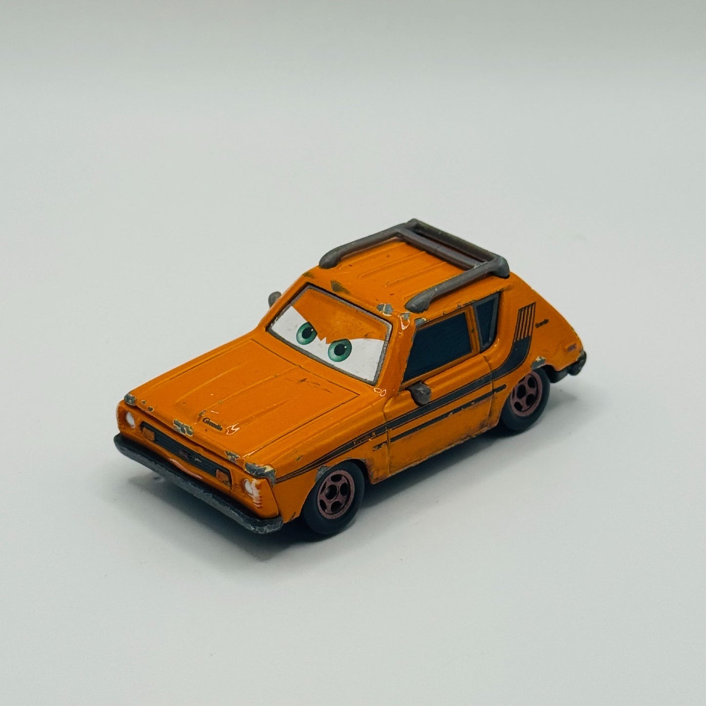 Disney Pixar Cars - GREM [AMC Gremlin] - 1:55 Diecast