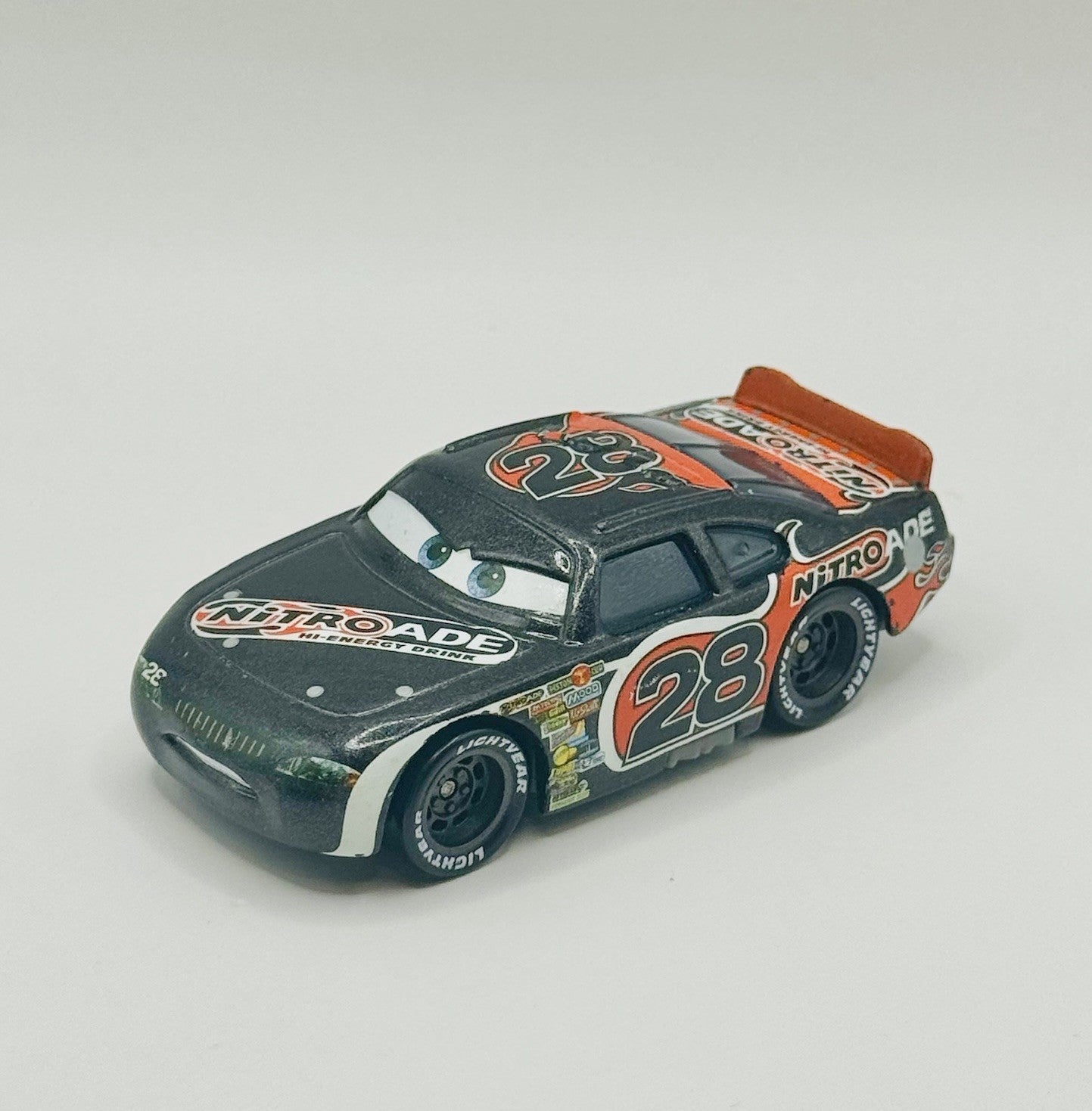 Disney Pixar Cars - NITROADE AIKEN AXLER #28 - 1:55 Diecast
