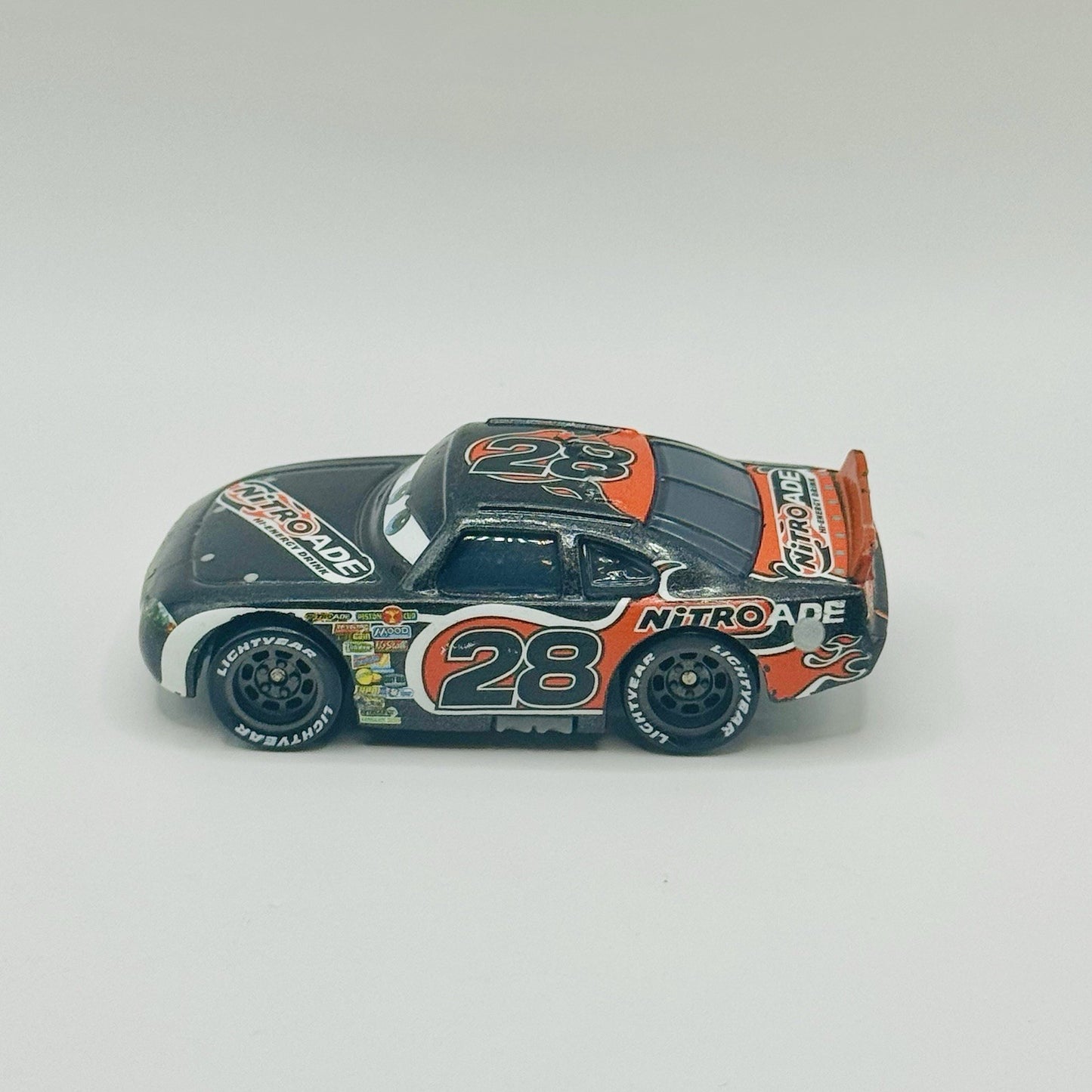 Disney Pixar Cars - NITROADE AIKEN AXLER #28 - 1:55 Diecast