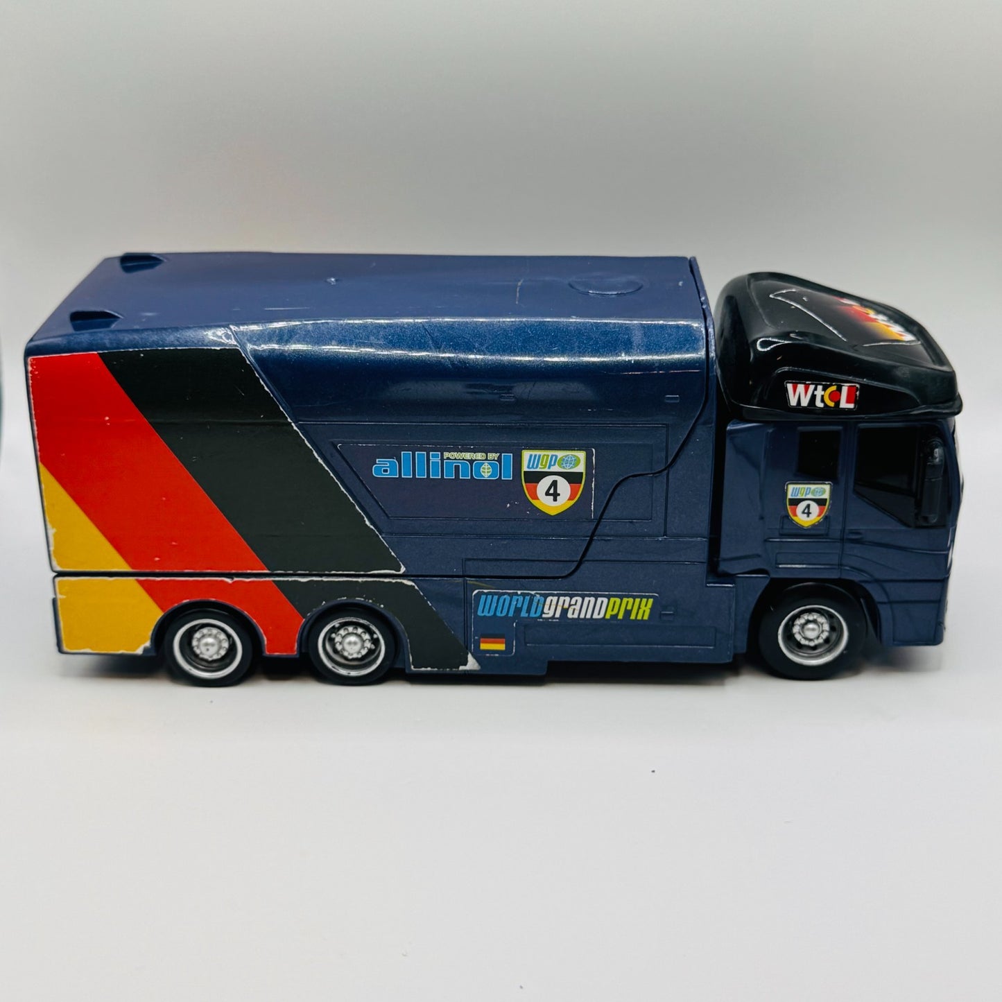 Disney Pixar Cars - MAX SCHNELL HAULER JORG Transforming Transporter 1:55 Scale