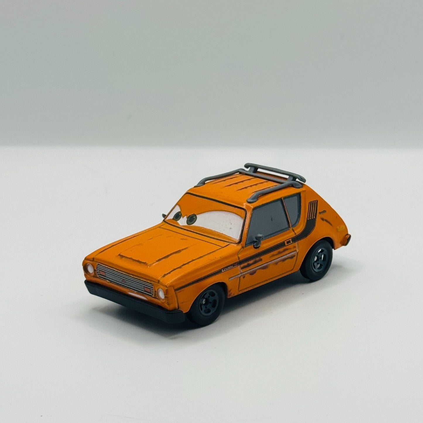 Disney Pixar Cars - GREM [AMC Gremlin] Disney Store - 1:43 Diecast