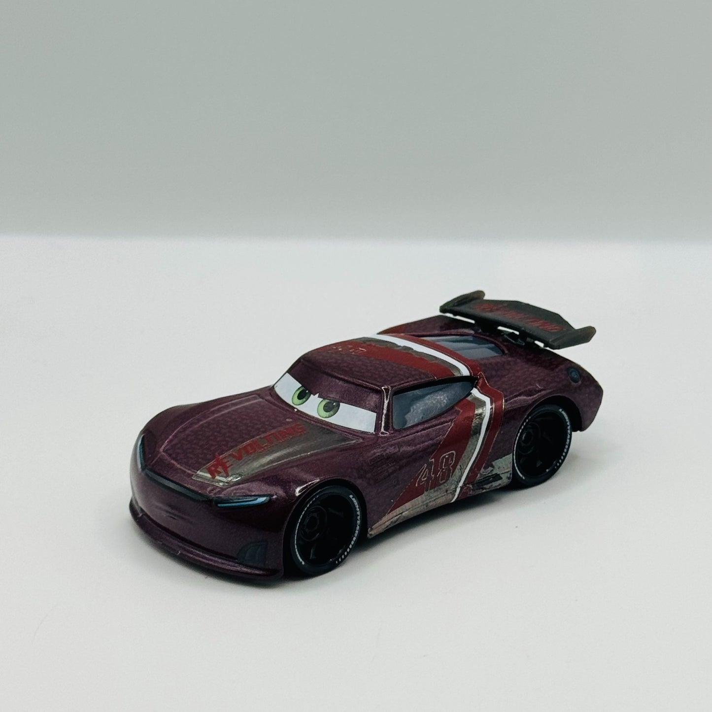 Disney Pixar Cars - AARON CLOCKER RE-VOLTING *CHINA* WINDOW BARS - 1:55 Diecast