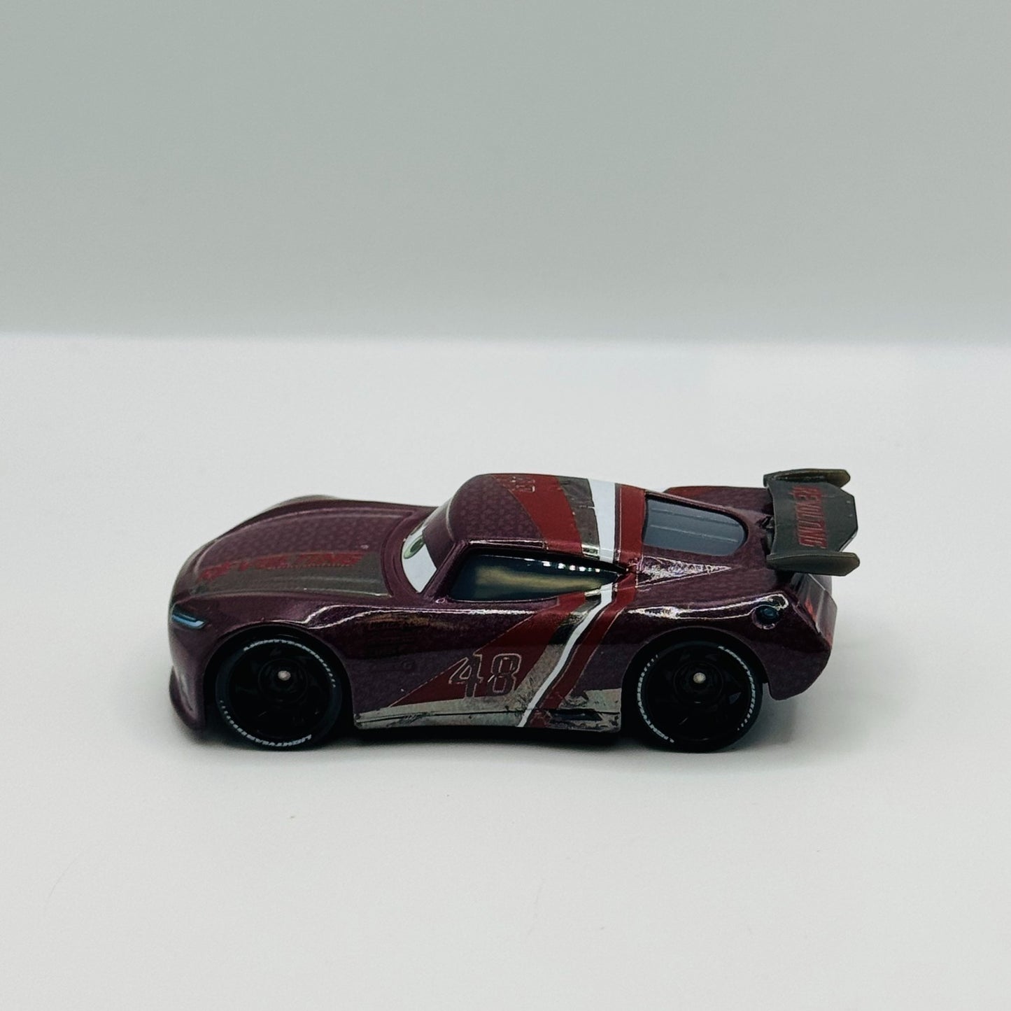 Disney Pixar Cars - AARON CLOCKER RE-VOLTING *CHINA* WINDOW BARS - 1:55 Diecast