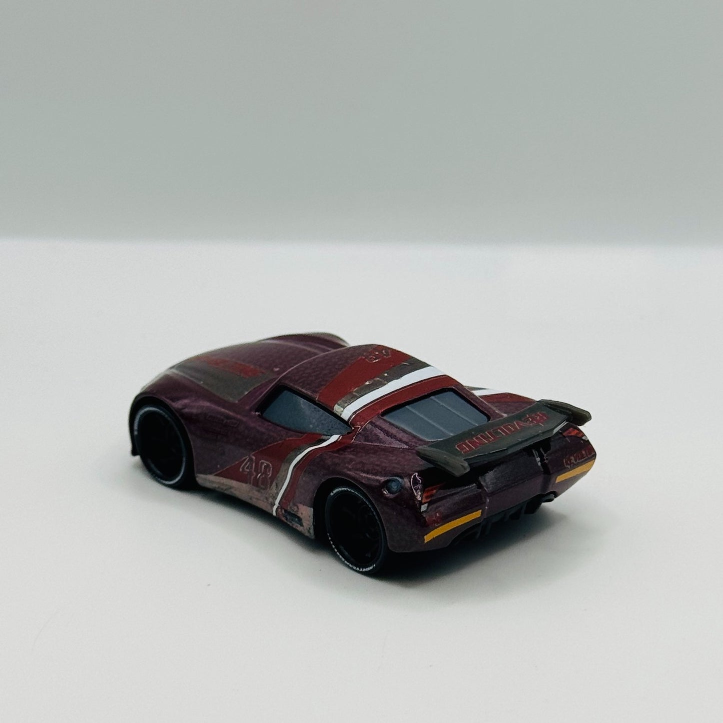 Disney Pixar Cars - AARON CLOCKER RE-VOLTING *CHINA* WINDOW BARS - 1:55 Diecast