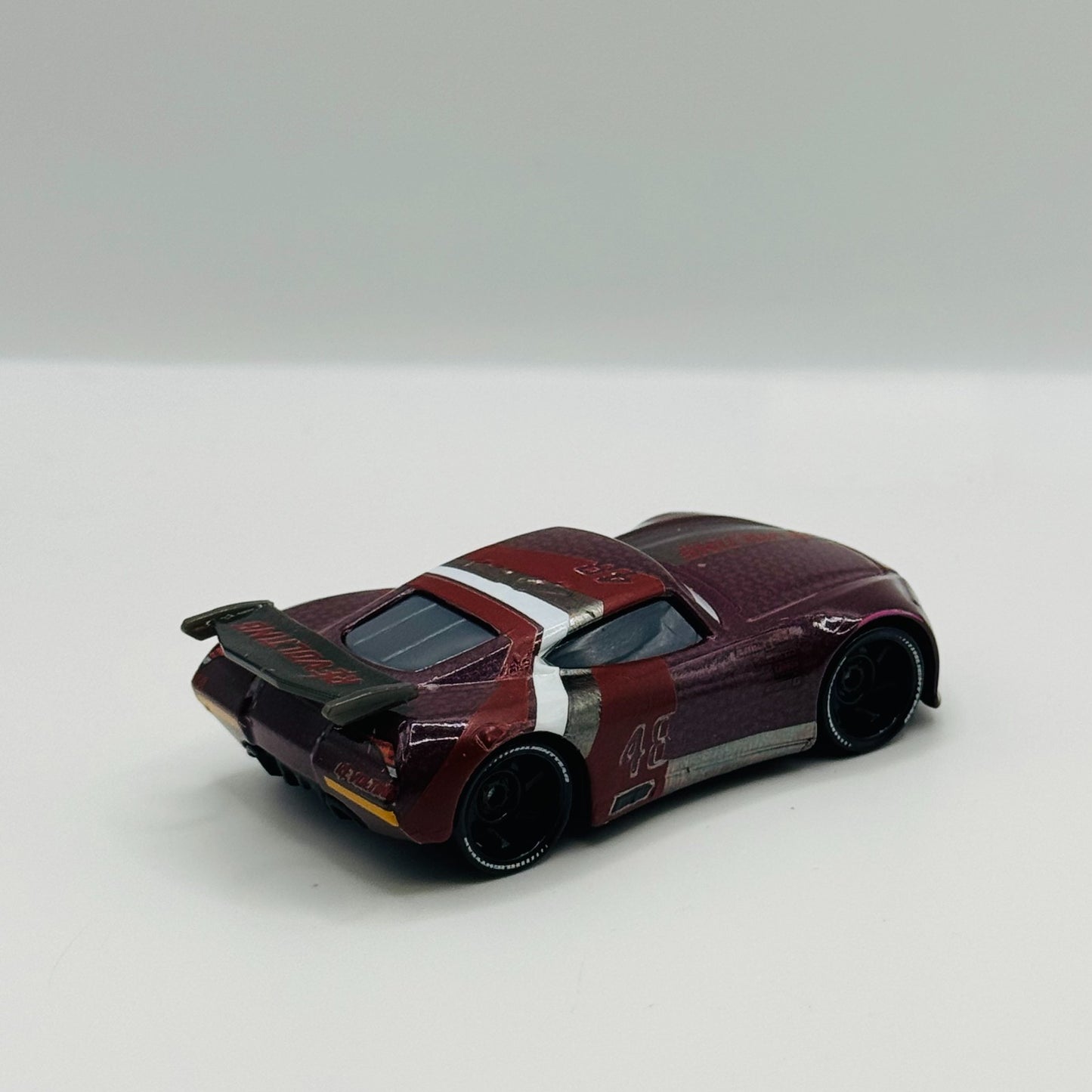 Disney Pixar Cars - AARON CLOCKER RE-VOLTING *CHINA* WINDOW BARS - 1:55 Diecast