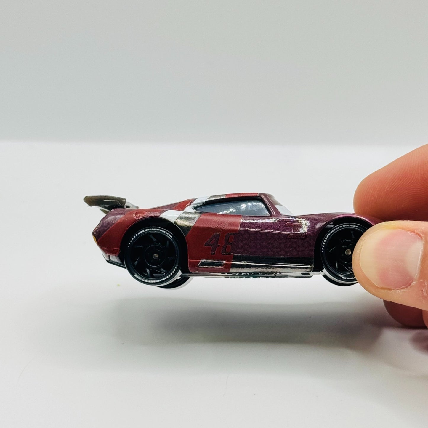 Disney Pixar Cars - AARON CLOCKER RE-VOLTING *CHINA* WINDOW BARS - 1:55 Diecast