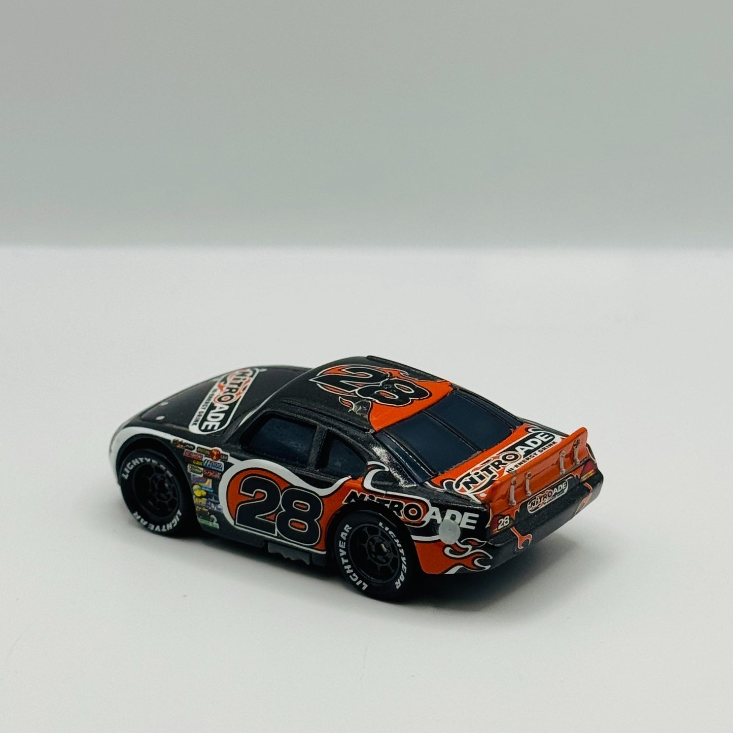 Disney Pixar Cars - NITROADE AIKEN AXLER Piston Cup - 1:55 Diecast