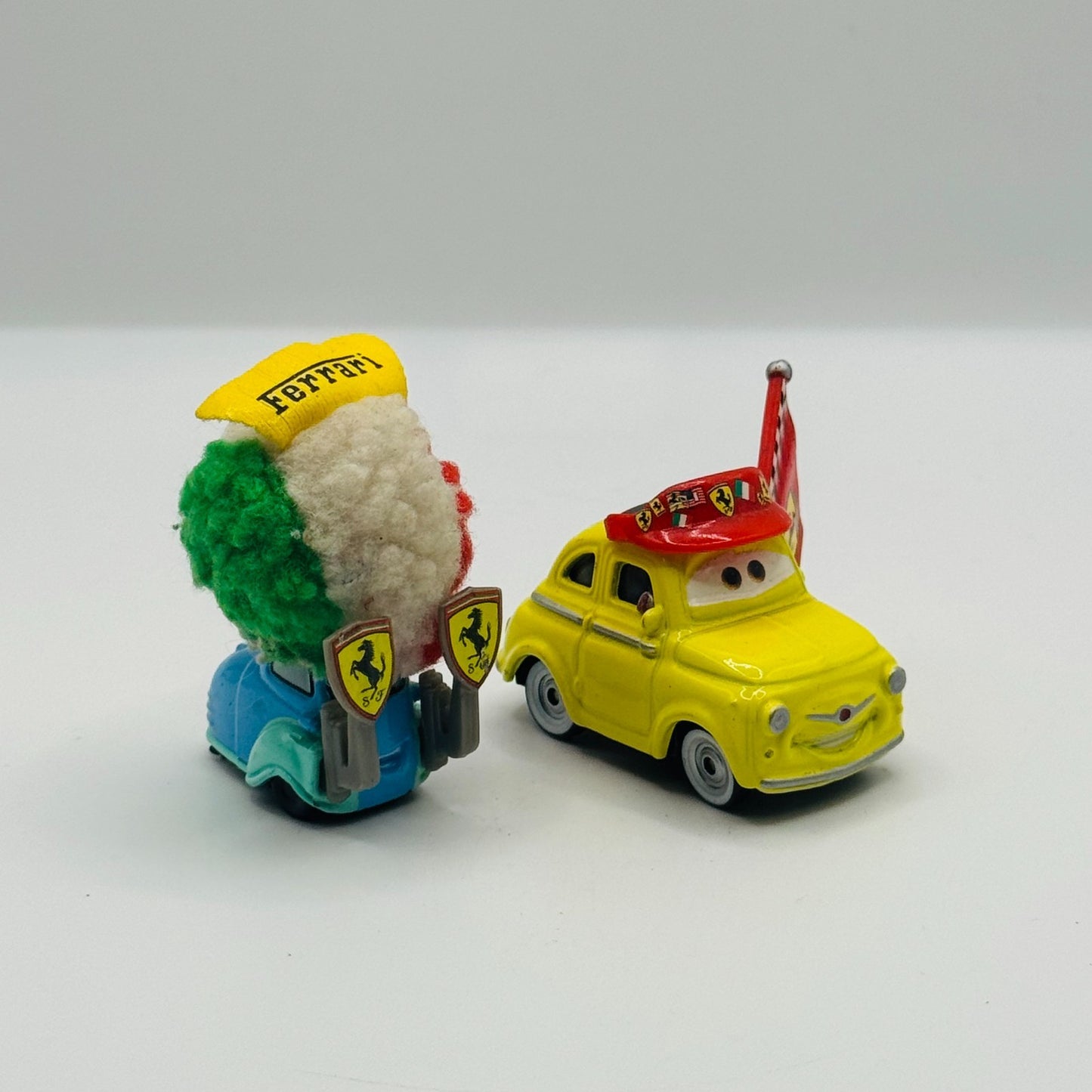 Disney Pixar Cars - FERRARI FANS LUIGI & GUIDO (1 Missing Flag) - 1:55 Diecast