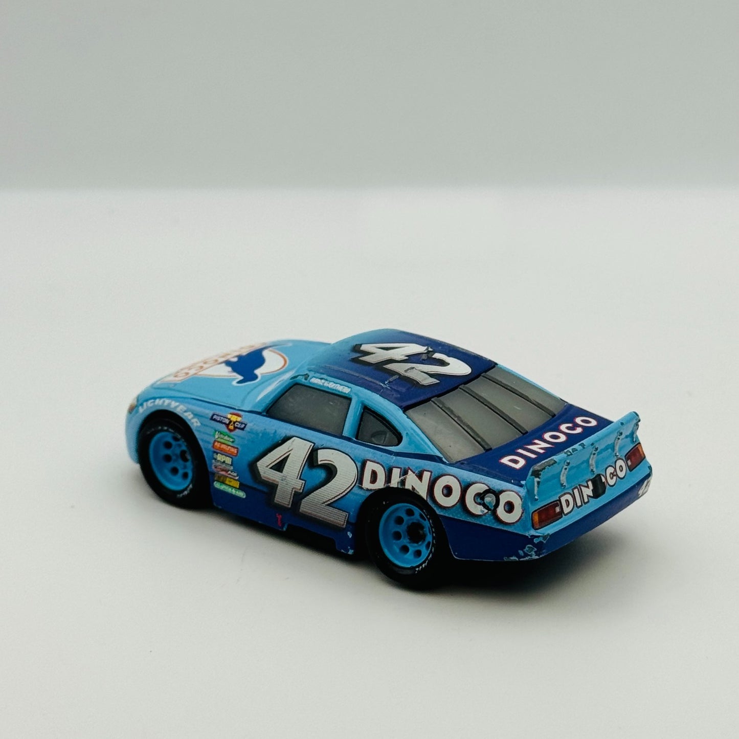 Disney Pixar Cars - CAL WEATHERS DINOCO #42 - 1:55 Diecast *Bent Wheel*