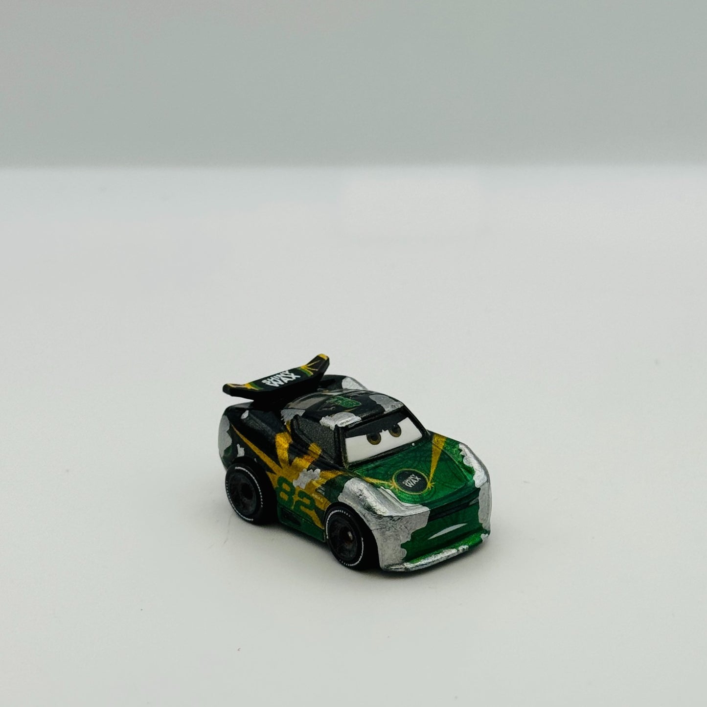 Disney Pixar Cars - Mini Racers CONRAD CAMBER SHINY WAX - Diecast *Very Used*