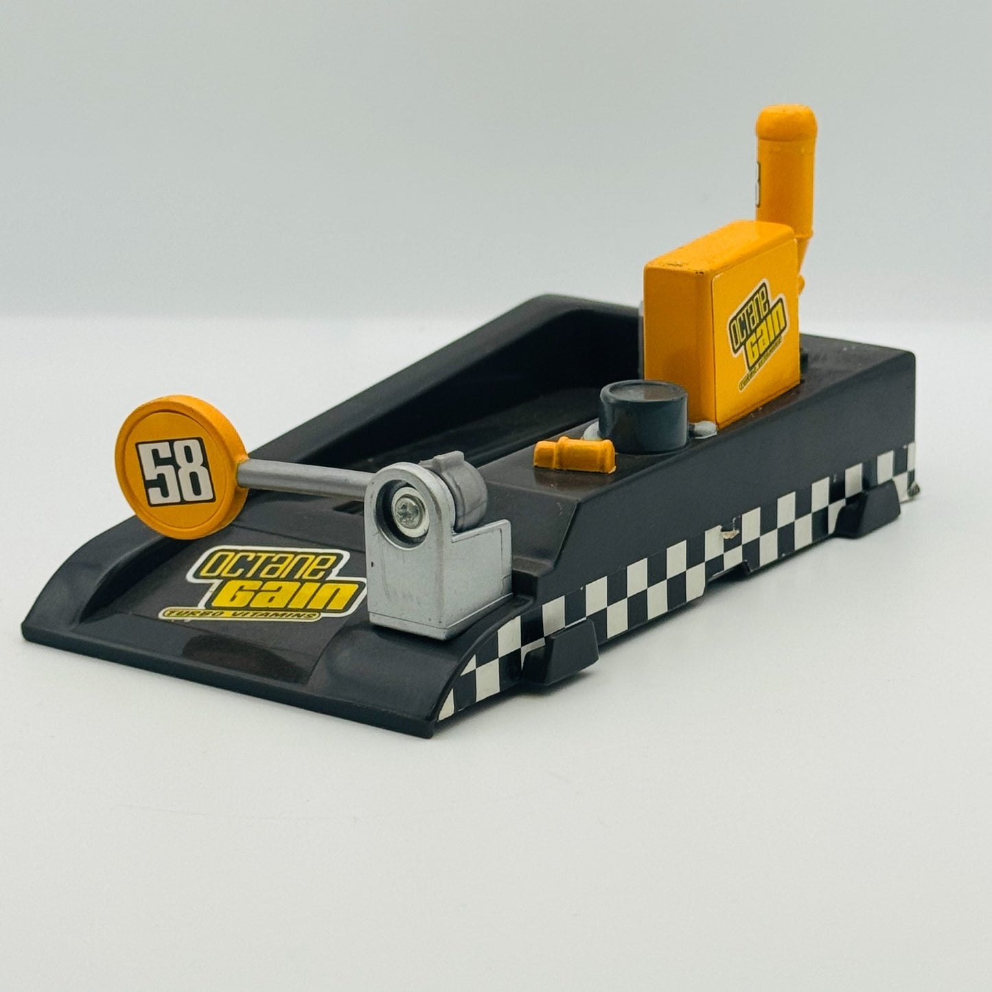 Disney Pixar Cars - OCTANE GAIN PIT-RACE OFF LAUNCHER Piston Cup - 1:55 Diecast
